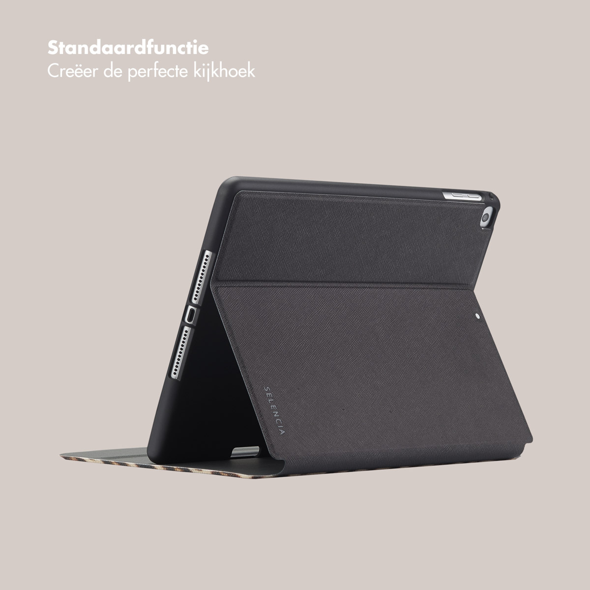 A dark gray tablet case stands open, revealing a patterned interior, against a neutral background.
