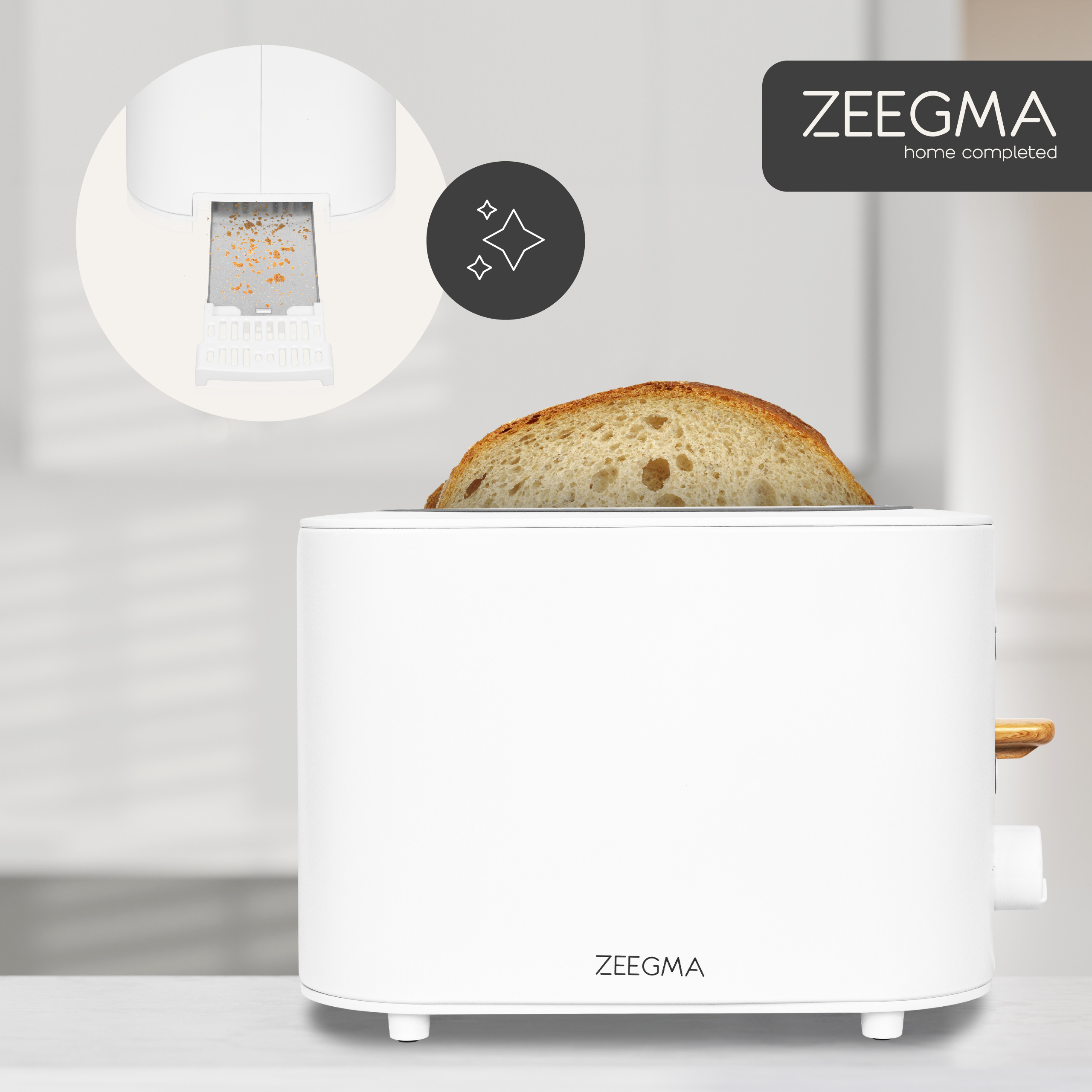 White toaster with a slice of bread. A detailed view shows crumbs in the crumb tray.