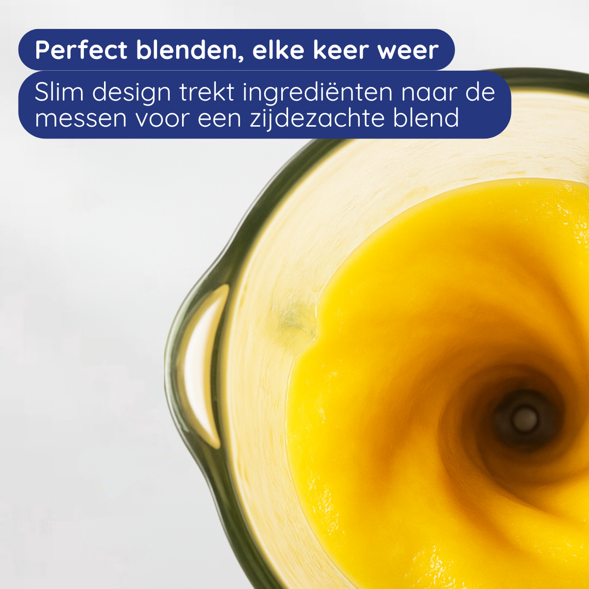 A blender with yellow liquid inside. The liquid is being blended. The text says it is perfect blending every time.