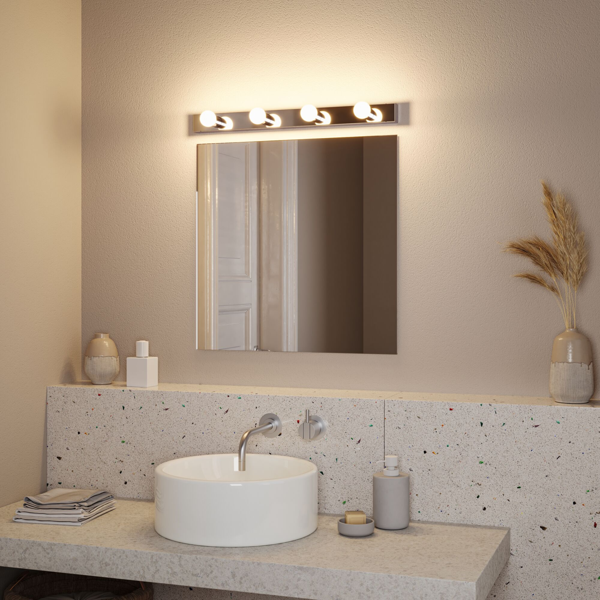 Łazienka z lustrem, umywalką i oprawą oświetleniową nad lustrem. Dominują neutralne kolory.