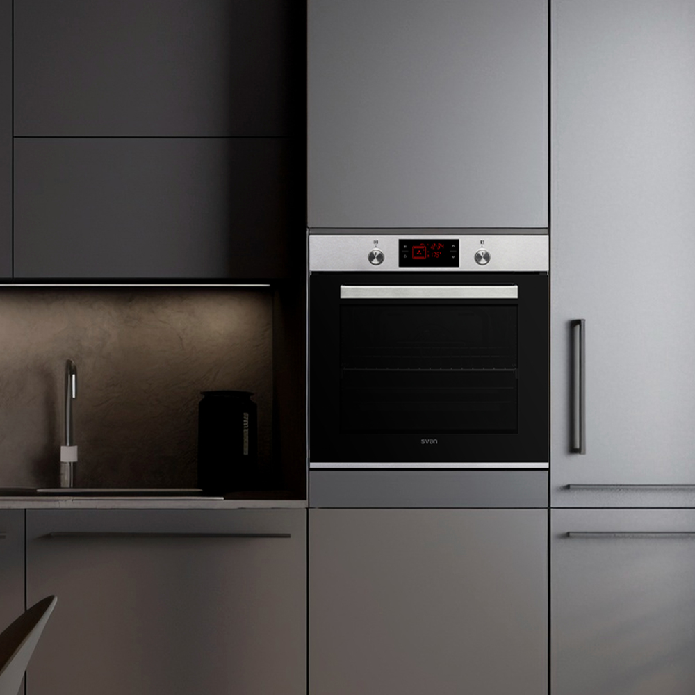Un horno instalado en un entorno de cocina moderno, con una estética elegante y gris oscuro.