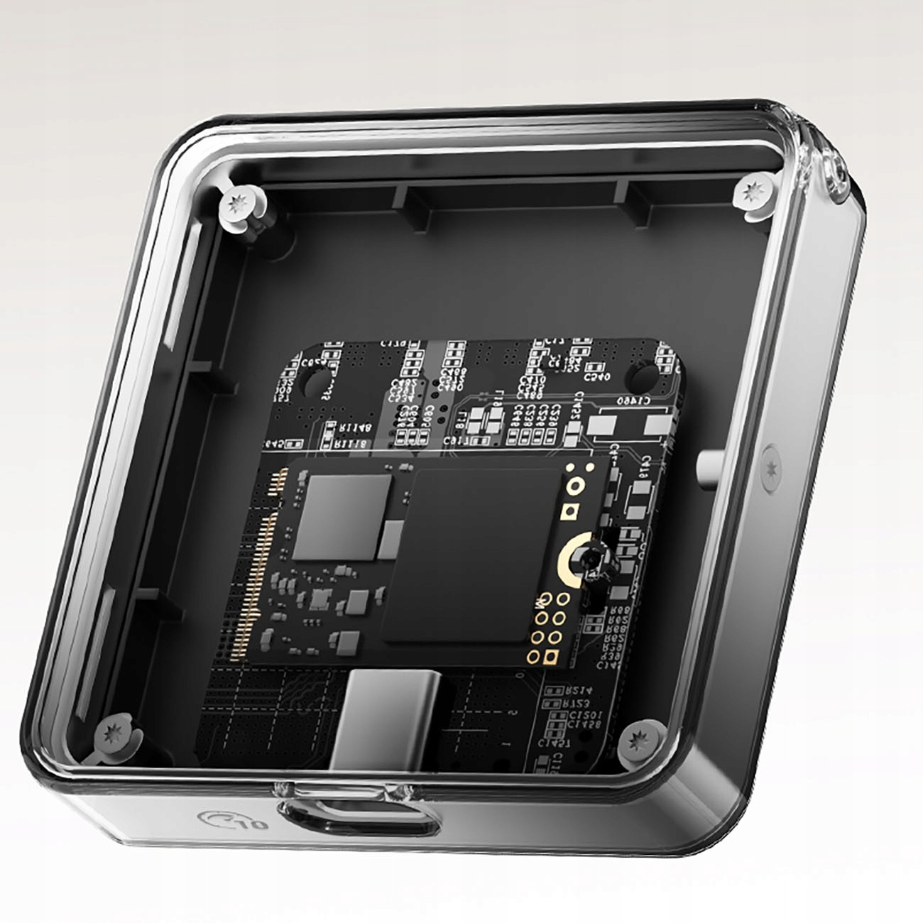 Przezroczysta obudowa odsłania czarną płytkę drukowaną z komponentami wewnątrz. Widoczny srebrny port USB.