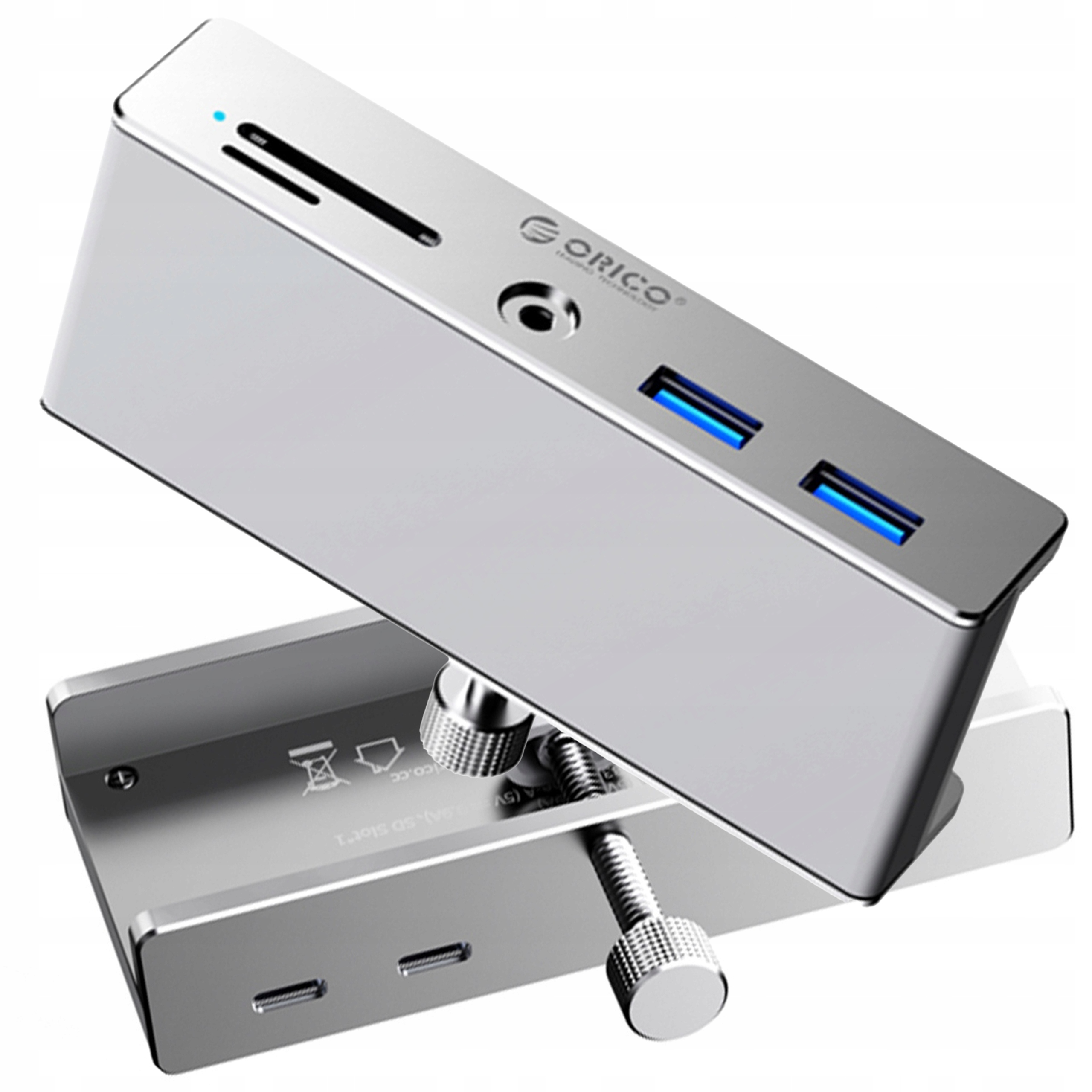 Srebrny hub USB z dwoma portami USB, gniazdem na kartę SD, gniazdem audio i wspornikiem montażowym.