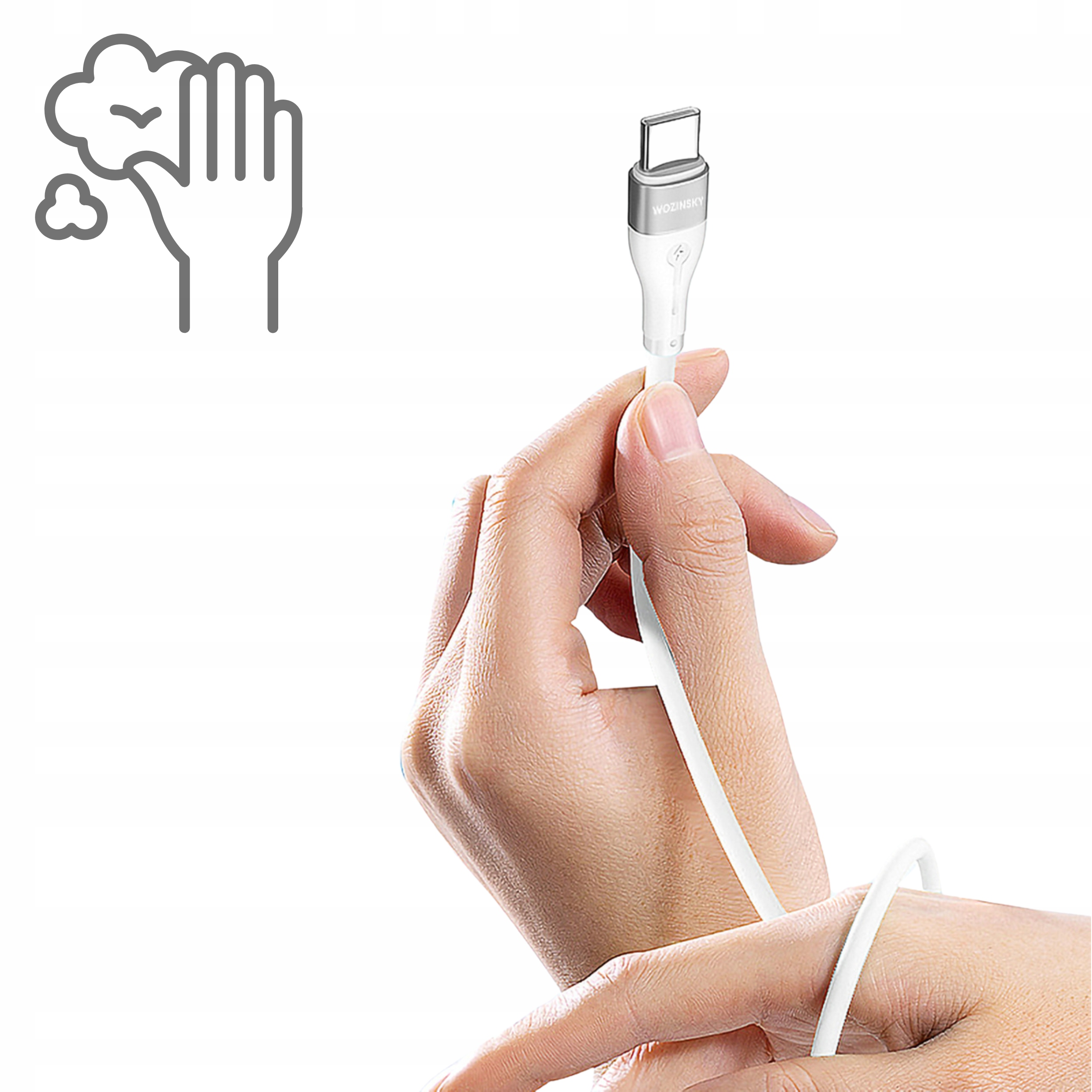 Dłoń trzymająca biały kabel. Kabel ma złącze USB-C.