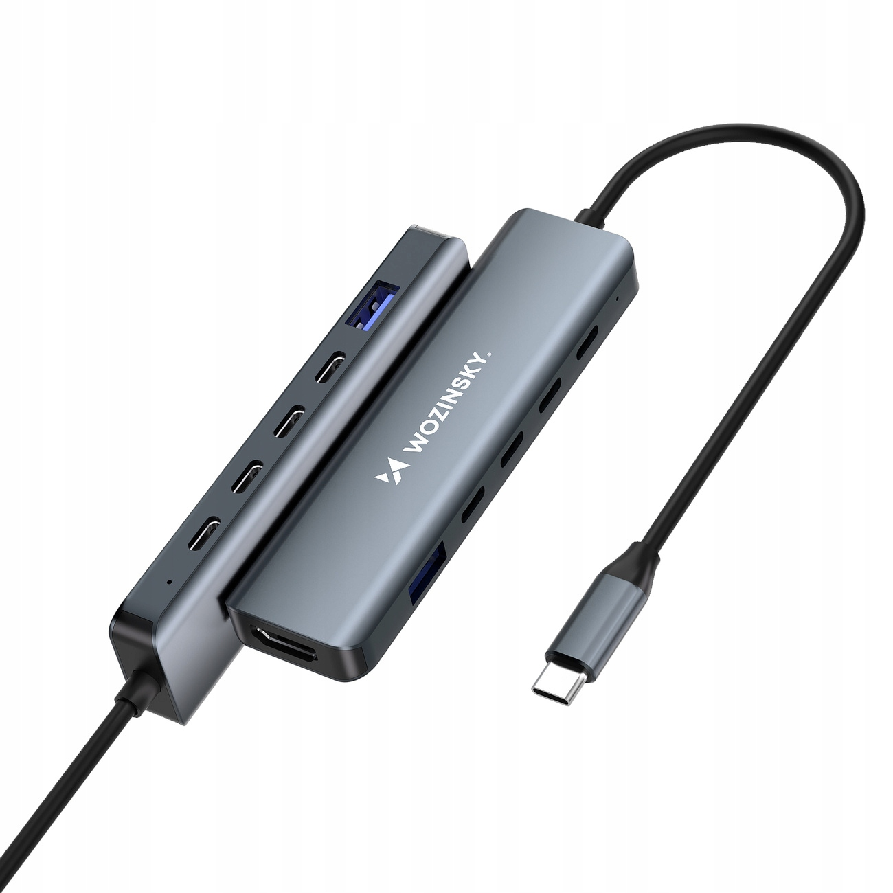 Wyświetlany jest hub USB-C z wieloma portami. Hub jest podłączony do kabla USB-C.