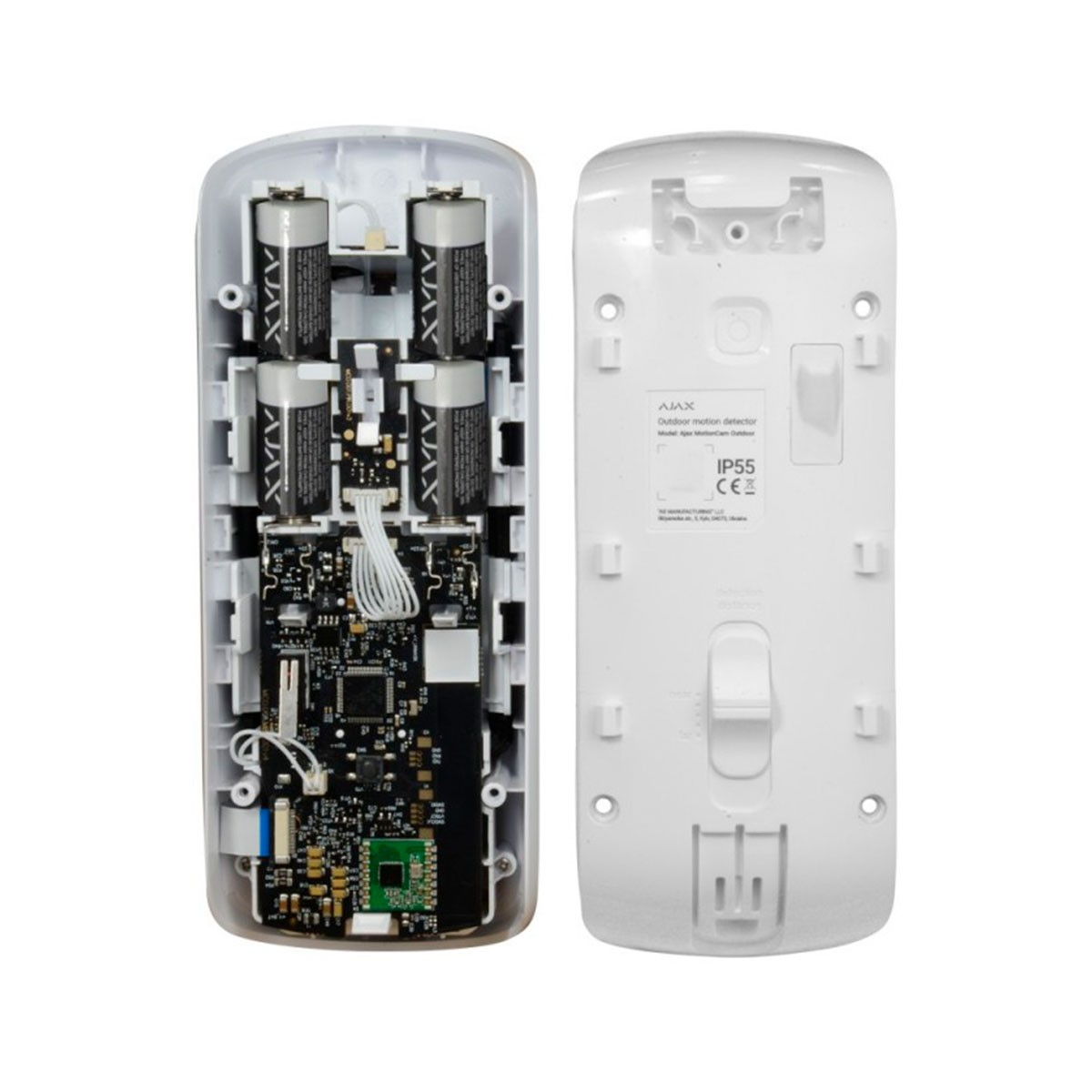 Un dispositivo di sicurezza bianco aperto che mostra batterie, un circuito stampato e componenti interni.