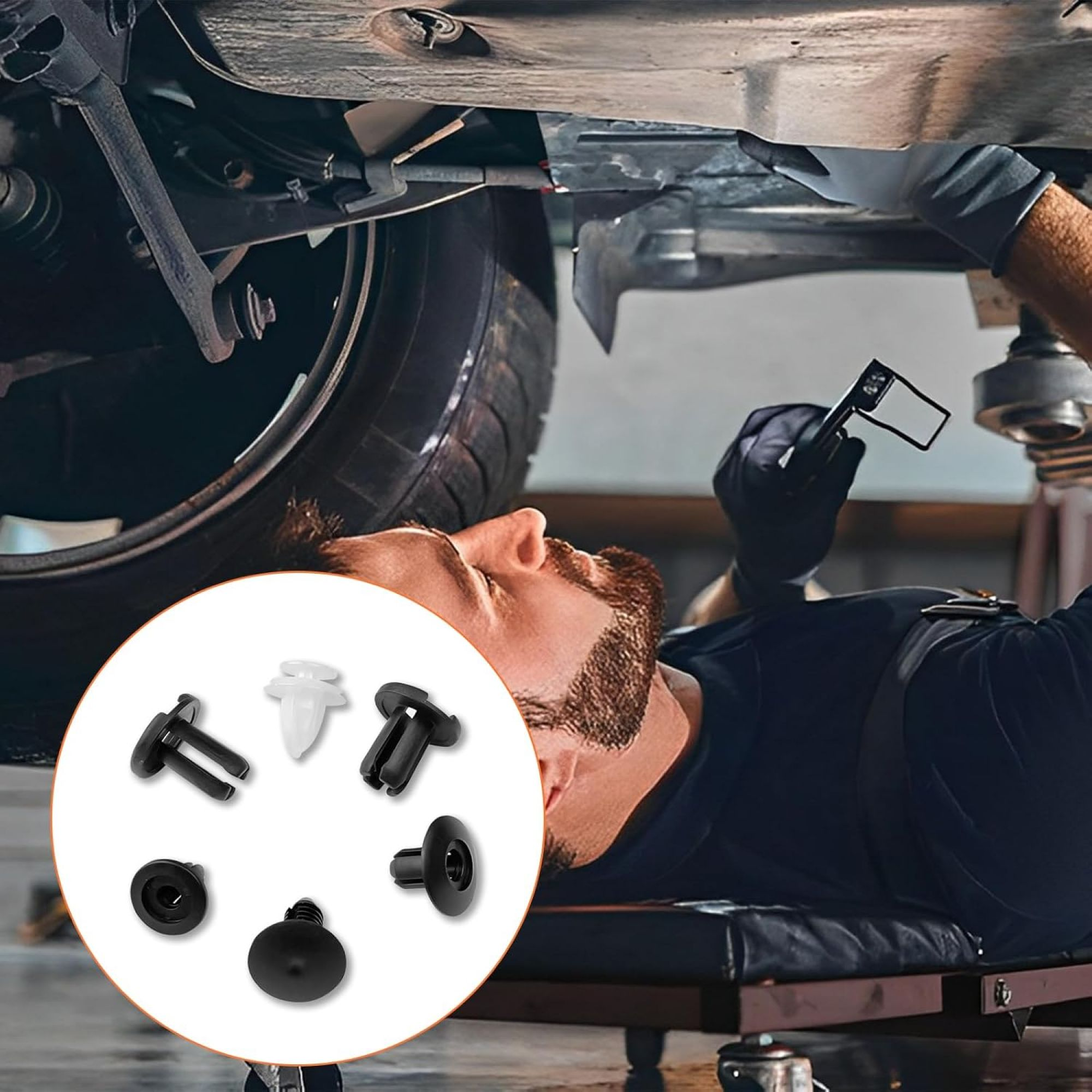 Ein Mechaniker arbeitet unter einem Auto, umgeben von verschiedenen schwarzen Kunststoffclips.