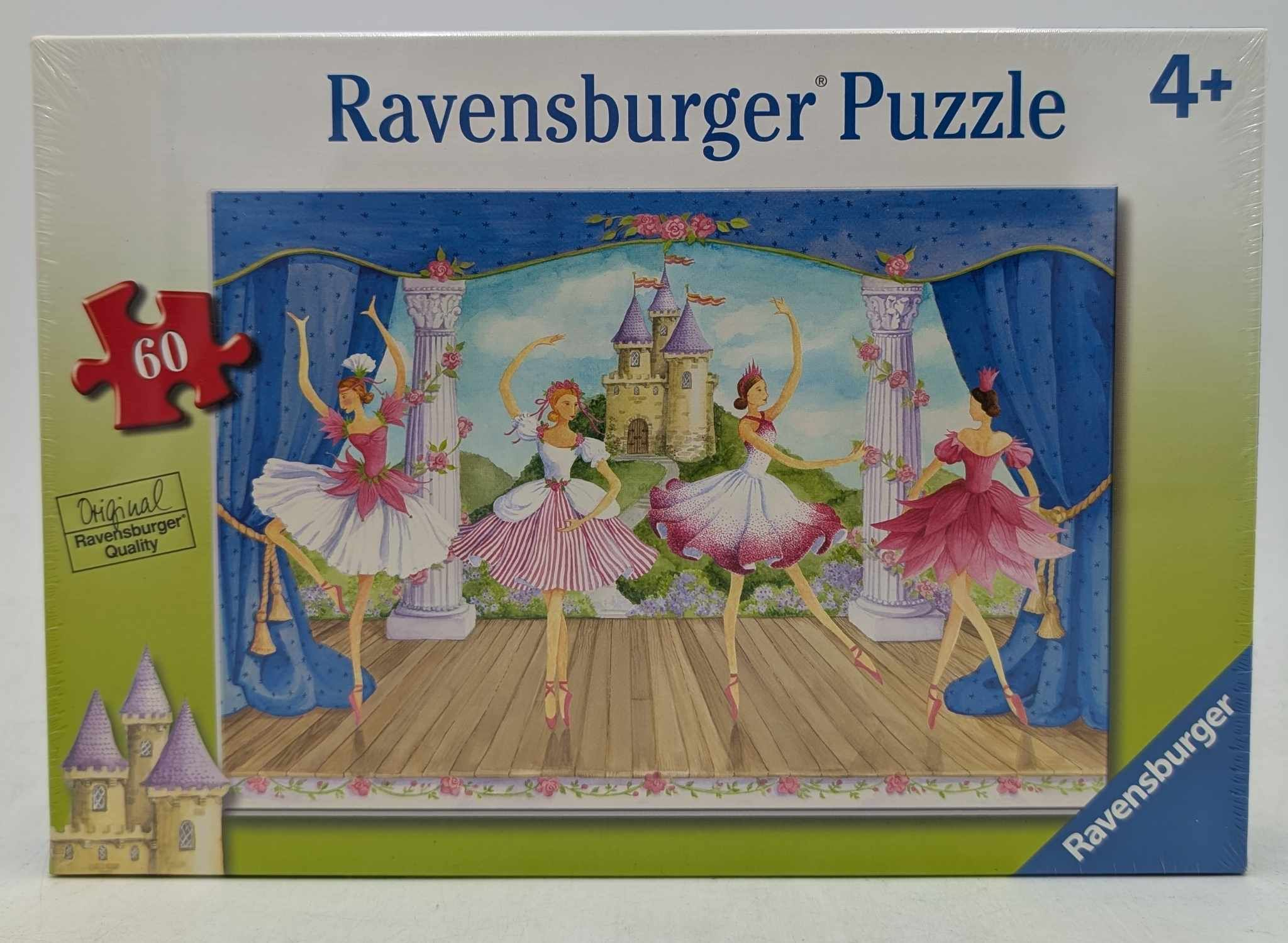 Puzzelbox mit einer Ballettszene mit Ballerinas auf der Bühne, einem Schloss im Hintergrund.