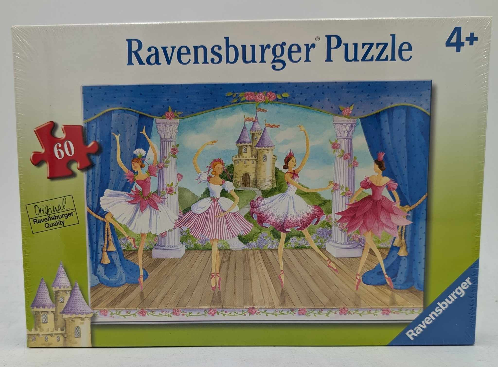 Puzzelbox mit einer Ballettszene mit Ballerinas auf der Bühne, ein Schloss im Hintergrund.