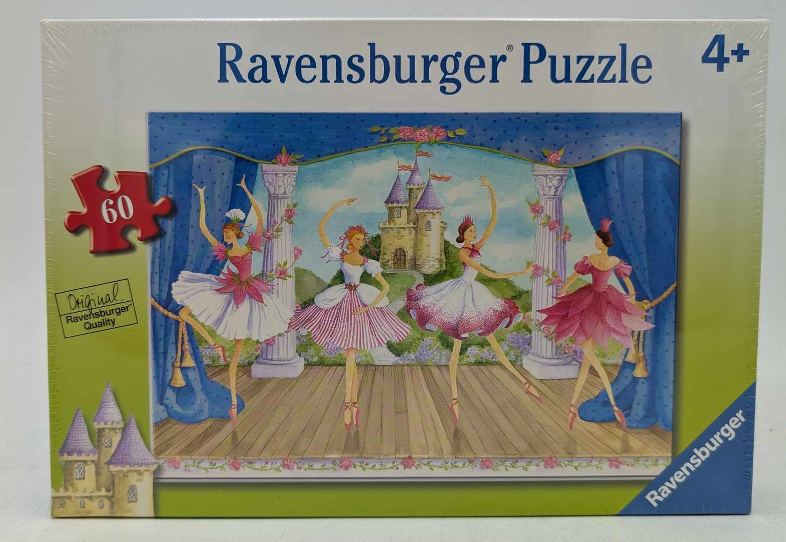 Puzzelbox mit einer Ballettszene mit Ballerinas auf einer Bühne. Im Hintergrund ein Schloss.