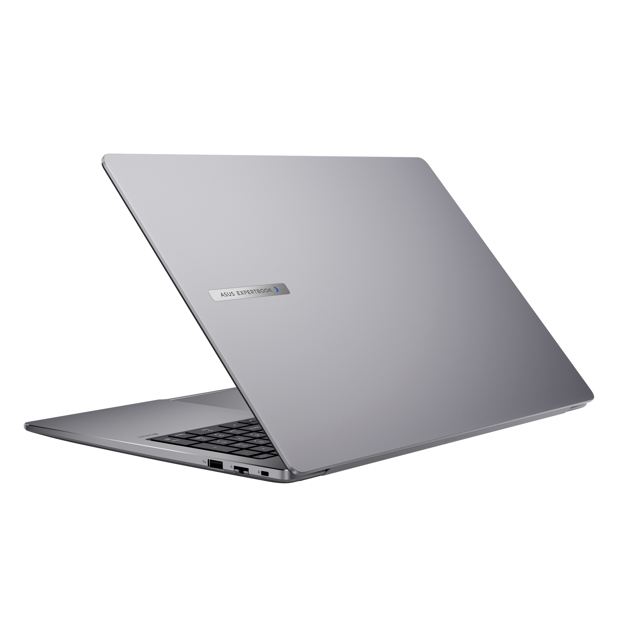 Srebrny laptop pod kątem, widok z tyłu. Etykieta ASUS ExpertBook na górze. Czarne tło.