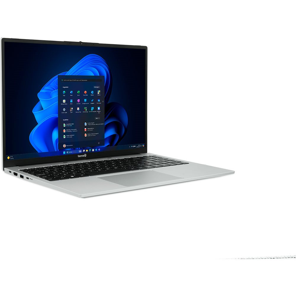 Srebrny laptop z ciemnoniebieskim ekranem z interfejsem Windows. Laptop jest otwarty.