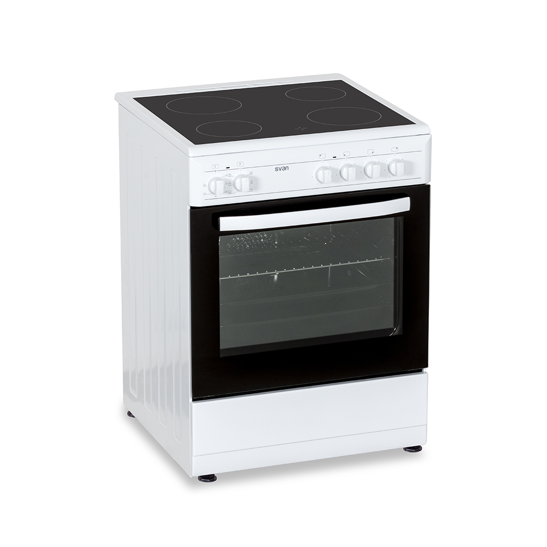 Horno blanco con placa de cocina negra. El horno tiene la puerta cerrada. La estufa se encuentra sobre una superficie blanca.