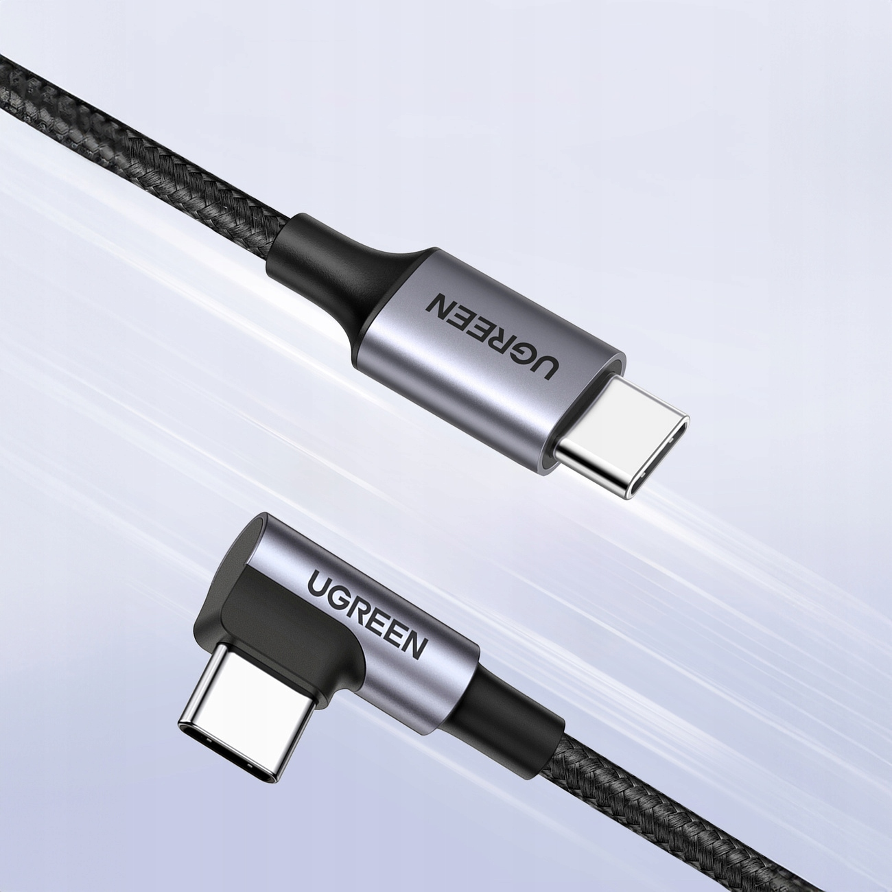 Dwa kable USB-C UGREEN, jeden kątowy, podłączony do urządzenia, plecione kable, srebrne złącza.