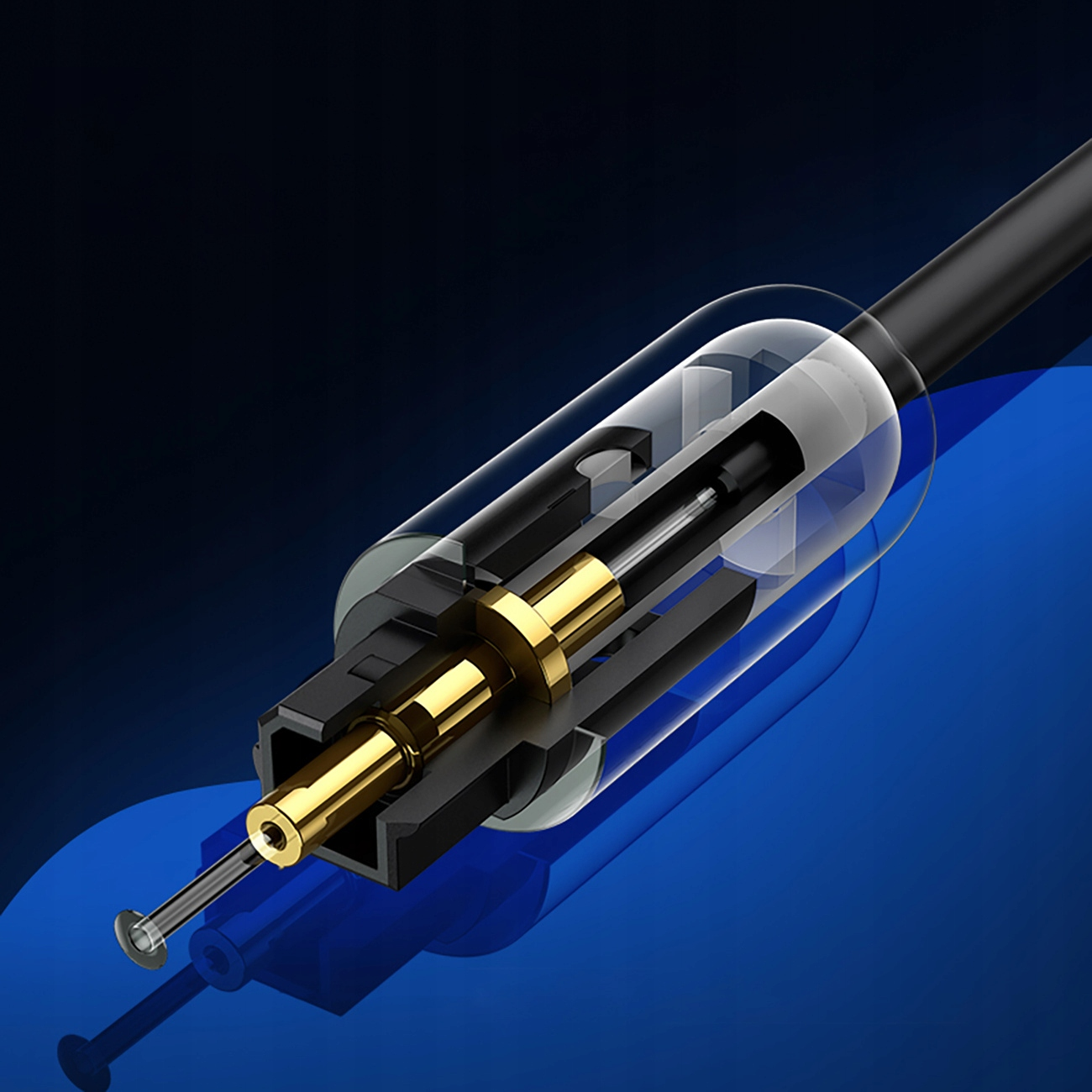 Zbliżenie przekroju poprzecznego czarnego kabla audio optycznego. Pokazuje wewnętrzne przewody i złącza.