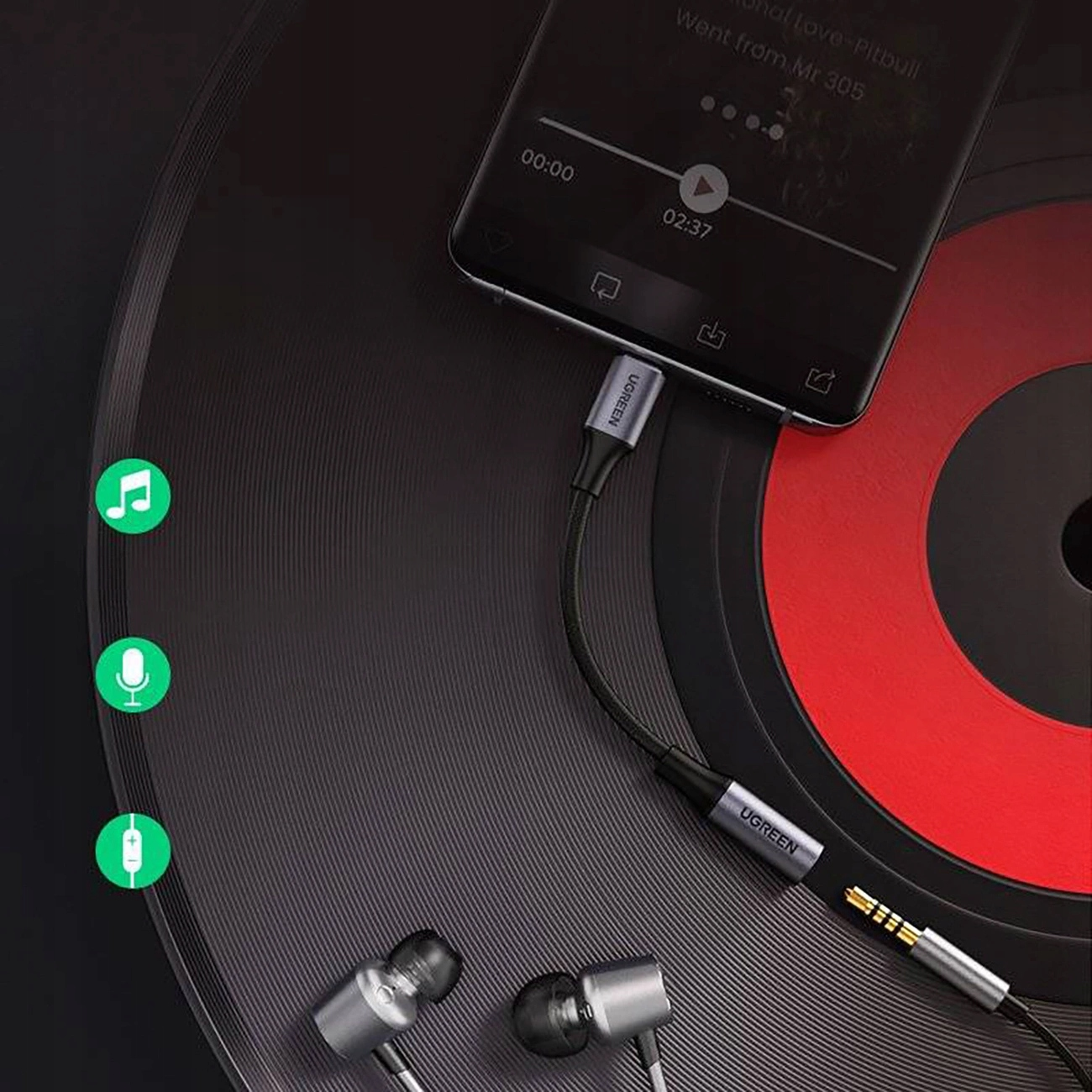 Telefon podłączony do adaptera, ze słuchawkami. Pokazane są ikony.