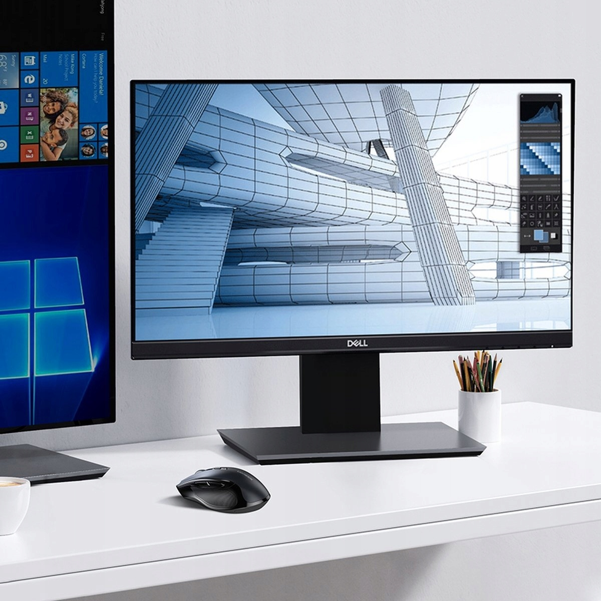 Dwa monitory komputerowe na białym biurku. Jeden wyświetla interfejs systemu Windows, a drugi interfejs oprogramowania.