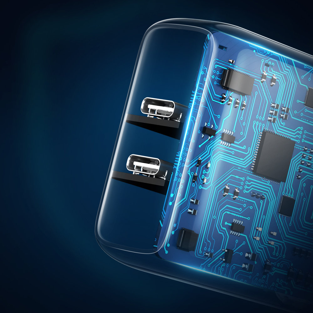 Ein transparenter USB-Lader mit sichtbarem Leiterplattendesign im Inneren. Es hat zwei USB-Anschlüsse.