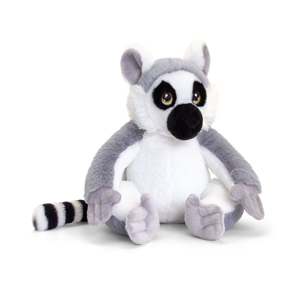 Ein Stofftier-Lemur. Es ist grau und weiß mit einem langen, schwarz-weiß gestreiften Schwanz. Es sitzt auf einer weißen Oberfläche.