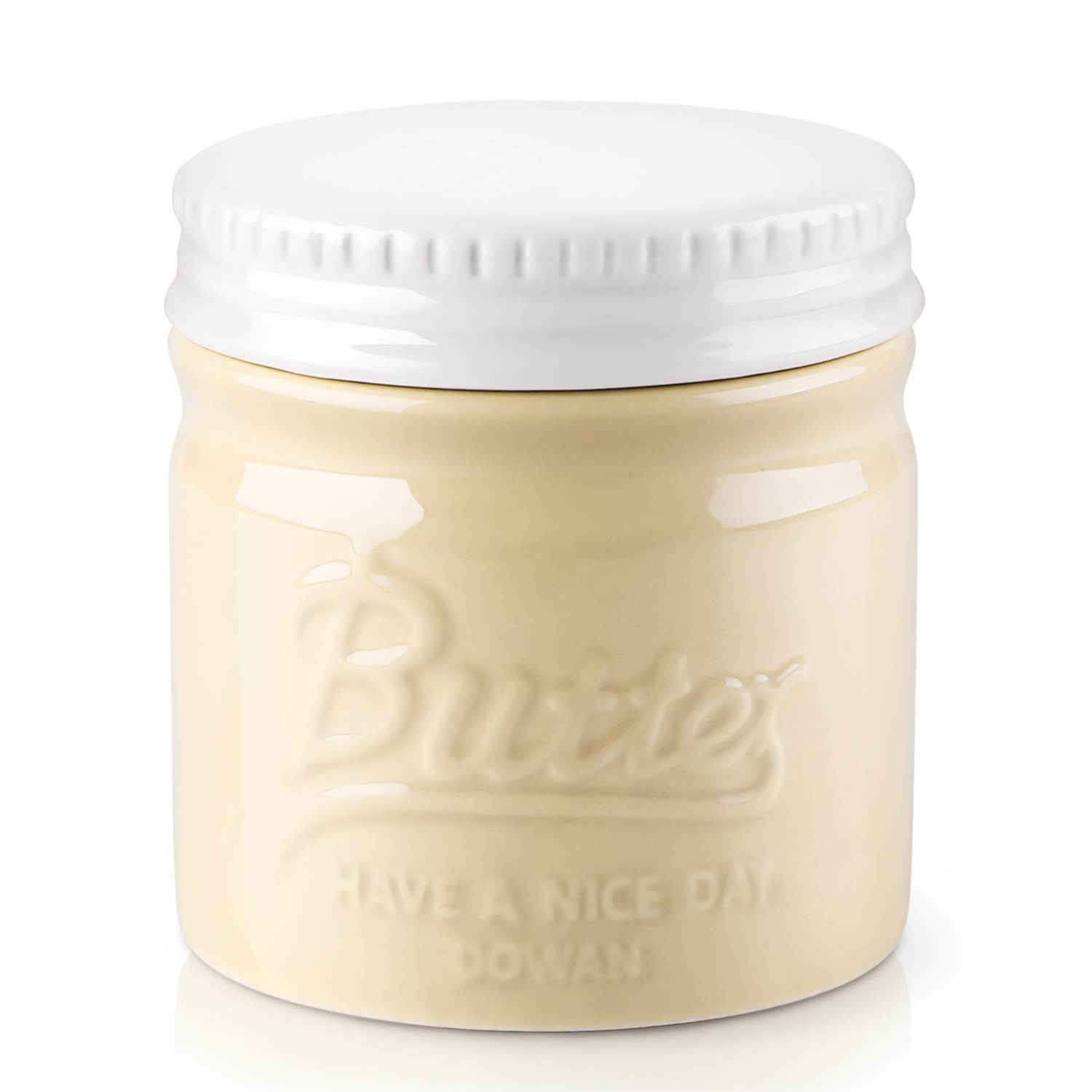 Ein cremefarbenes Butterglas mit dem Wort 'Butter' und 'Have a nice day' darauf geschrieben.