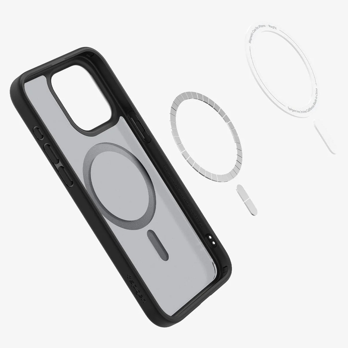 Zwarte telefoonhoes met doorzichtige achterkant, een losse ring en andere onderdelen tegen een witte achtergrond.