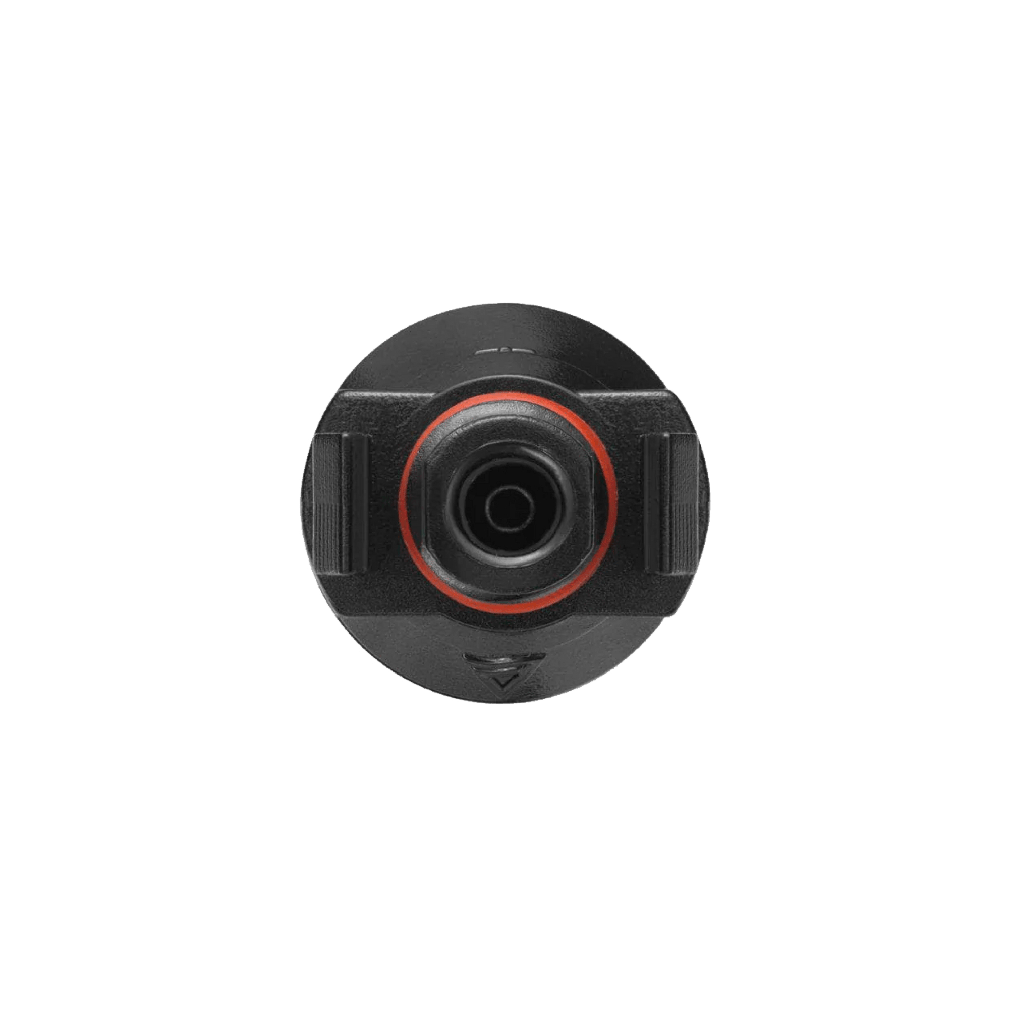 Zbliżenie czarnego mocowania z pomarańczowym pierścieniem.