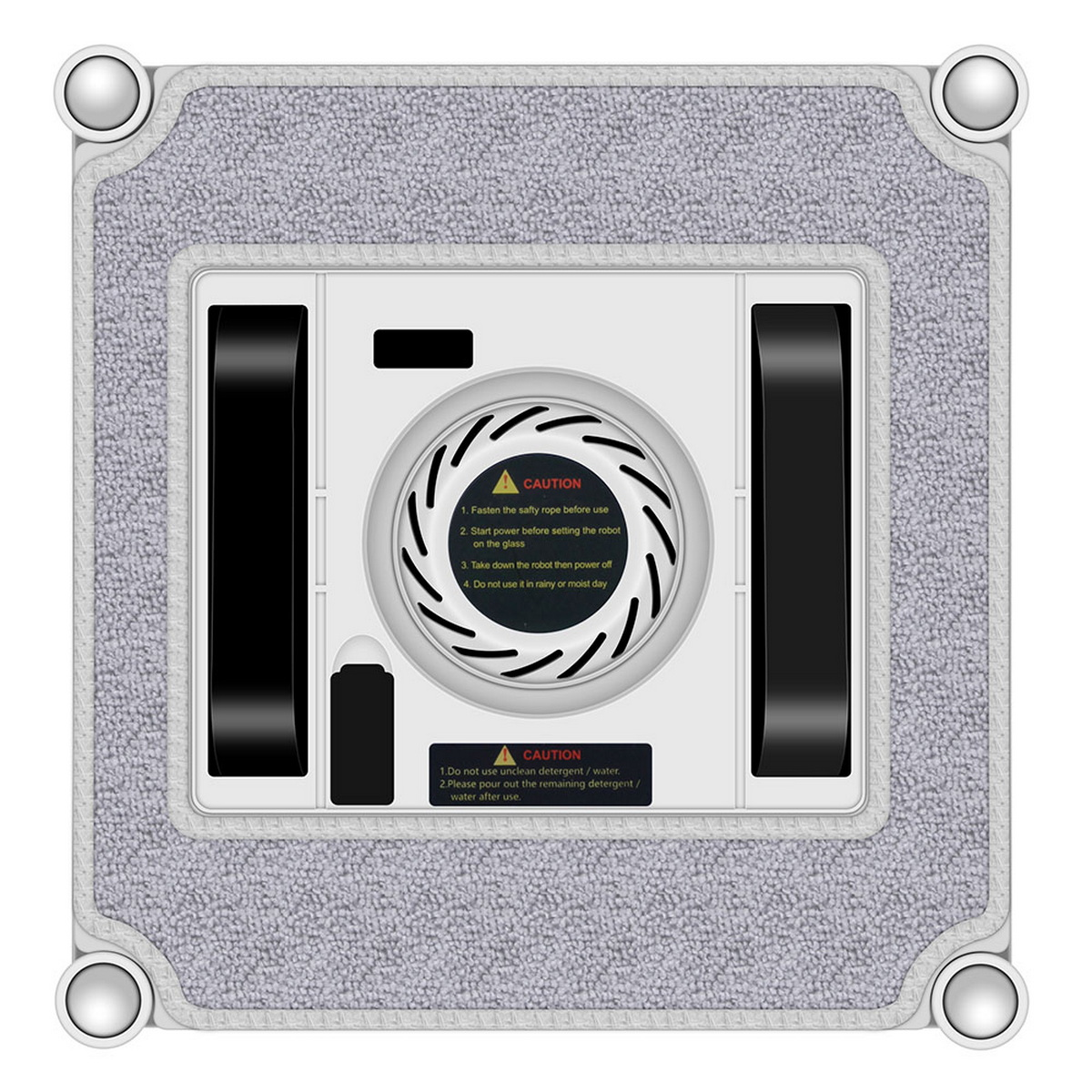 Widok z góry na robota do mycia okien. Ma szarą ramę, czarne elementy i etykietę ostrzegawczą pośrodku.