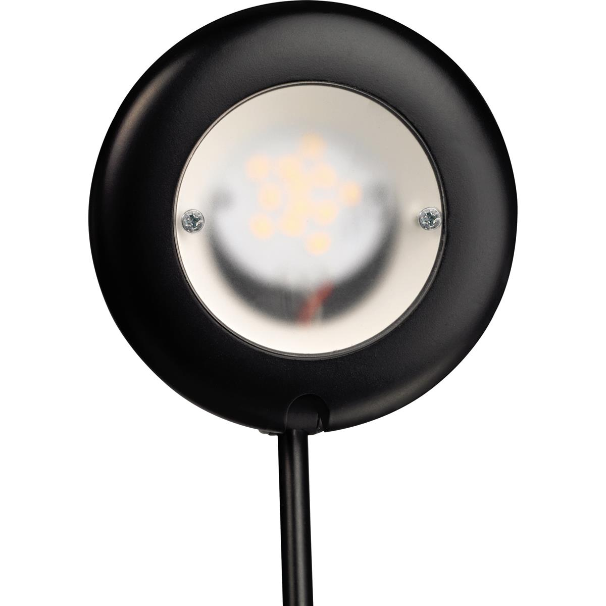 Eine schwarze, runde LED-Außenleuchte mit weißer Lichtquelle und schwarzem Sockel.