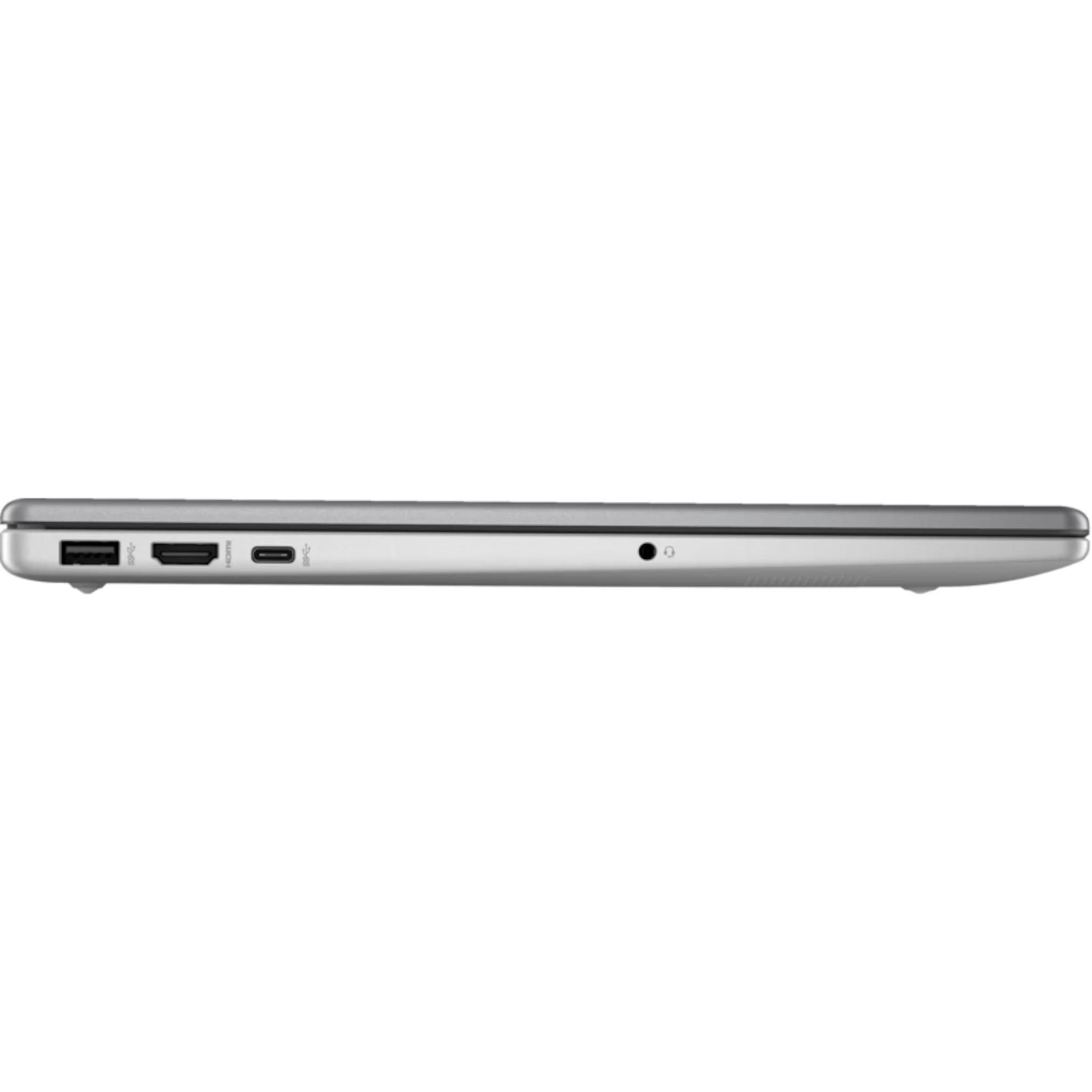 Seitenansicht des Laptops. Silberne Farbe, mit Anschlüssen und einem offenen Steckplatz.