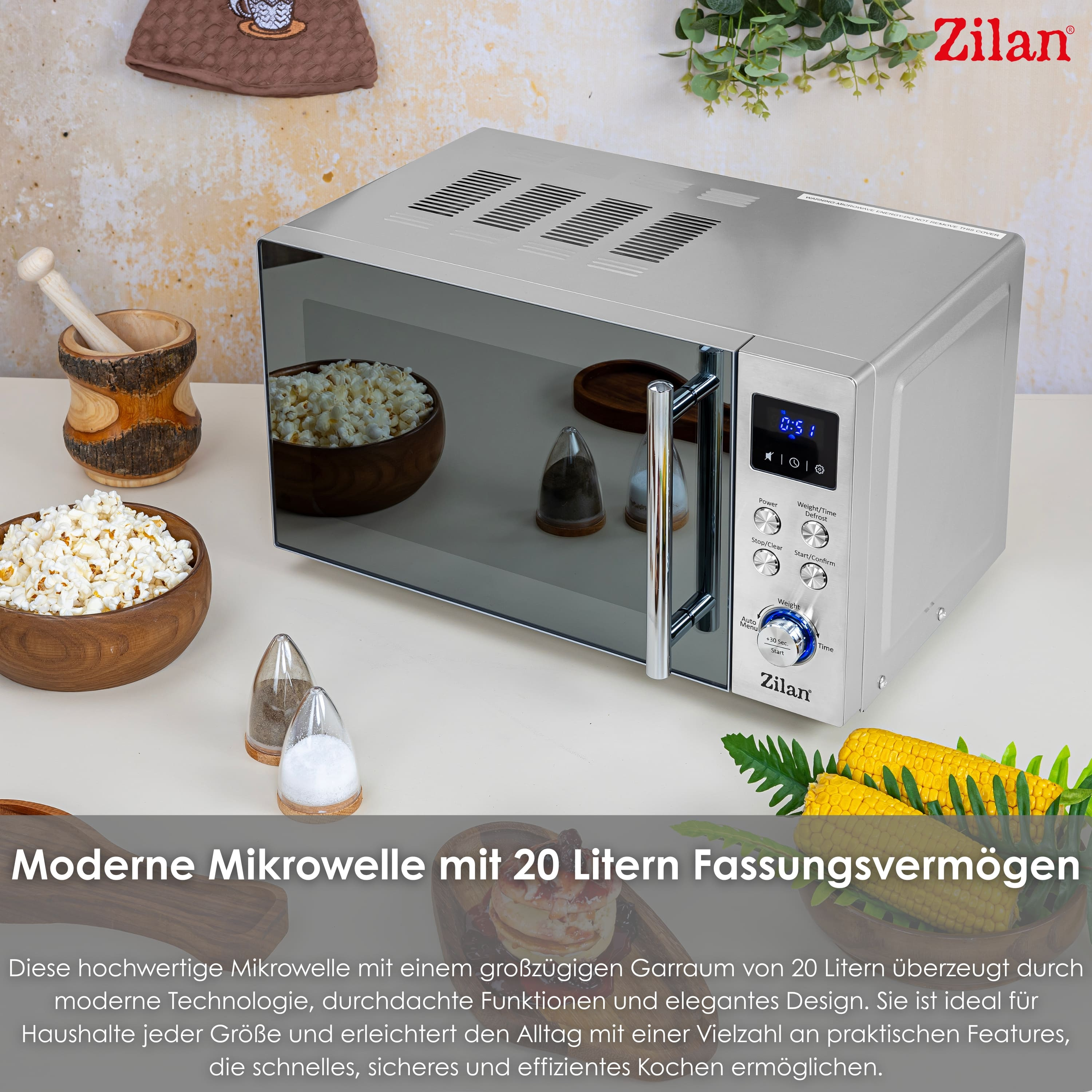 Silberne Mikrowelle mit Popcorn und Mais. Text: Moderne Mikrowelle mit 20 Litern Fassungsvermögen.