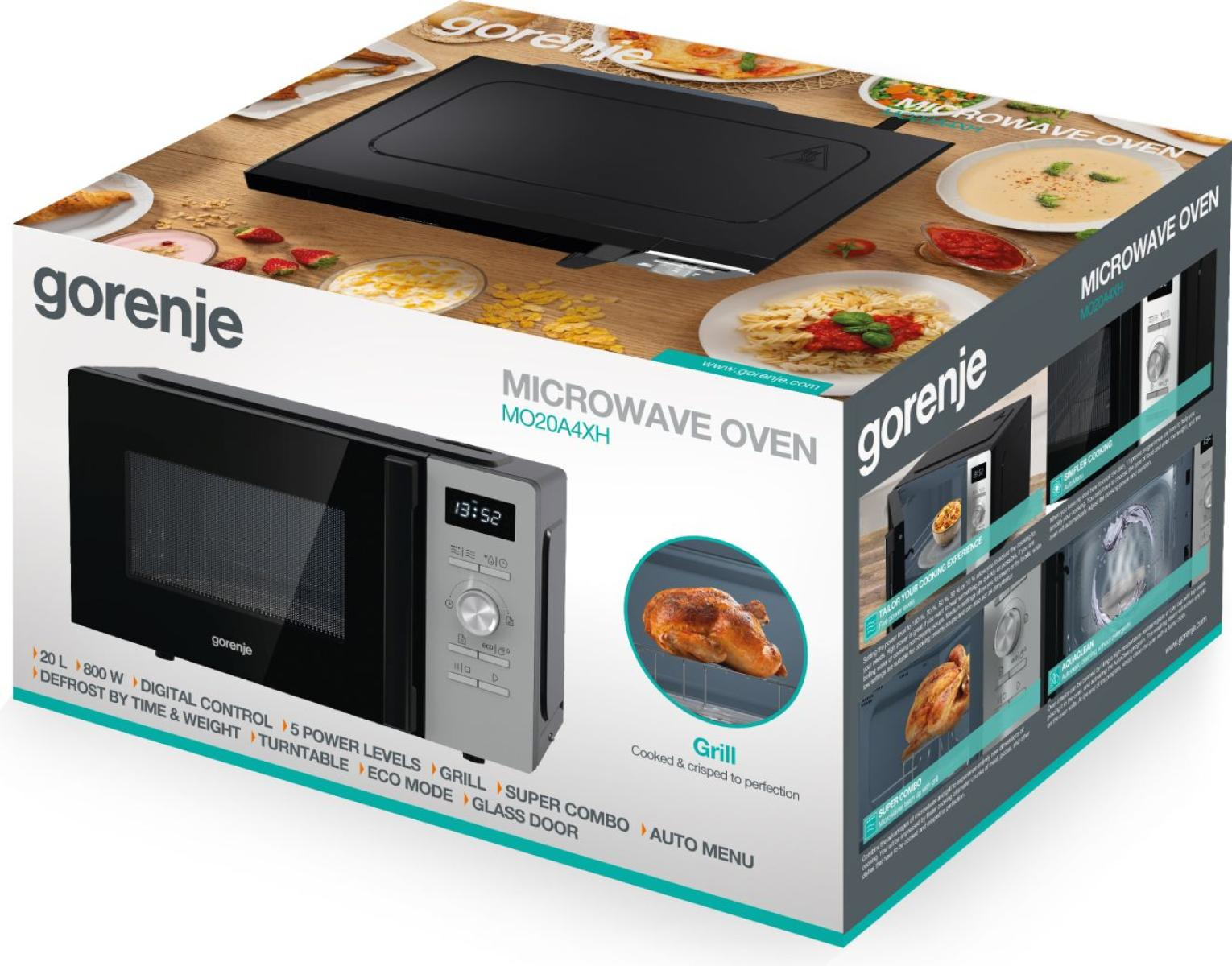 Scatola del forno a microonde. La scatola mostra il forno e le sue caratteristiche. C'è una foto di pollo arrosto.