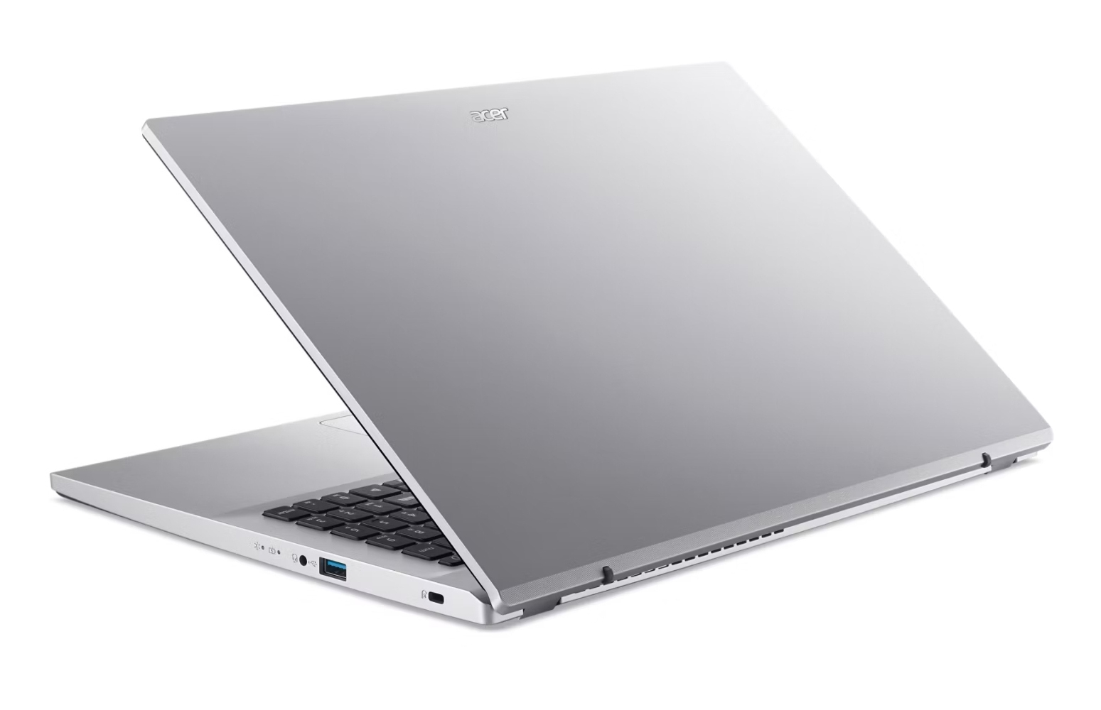 L'immagine mostra un laptop argentato, vista laterale, leggermente aperto, che mostra la parte posteriore e una parte della tastiera.