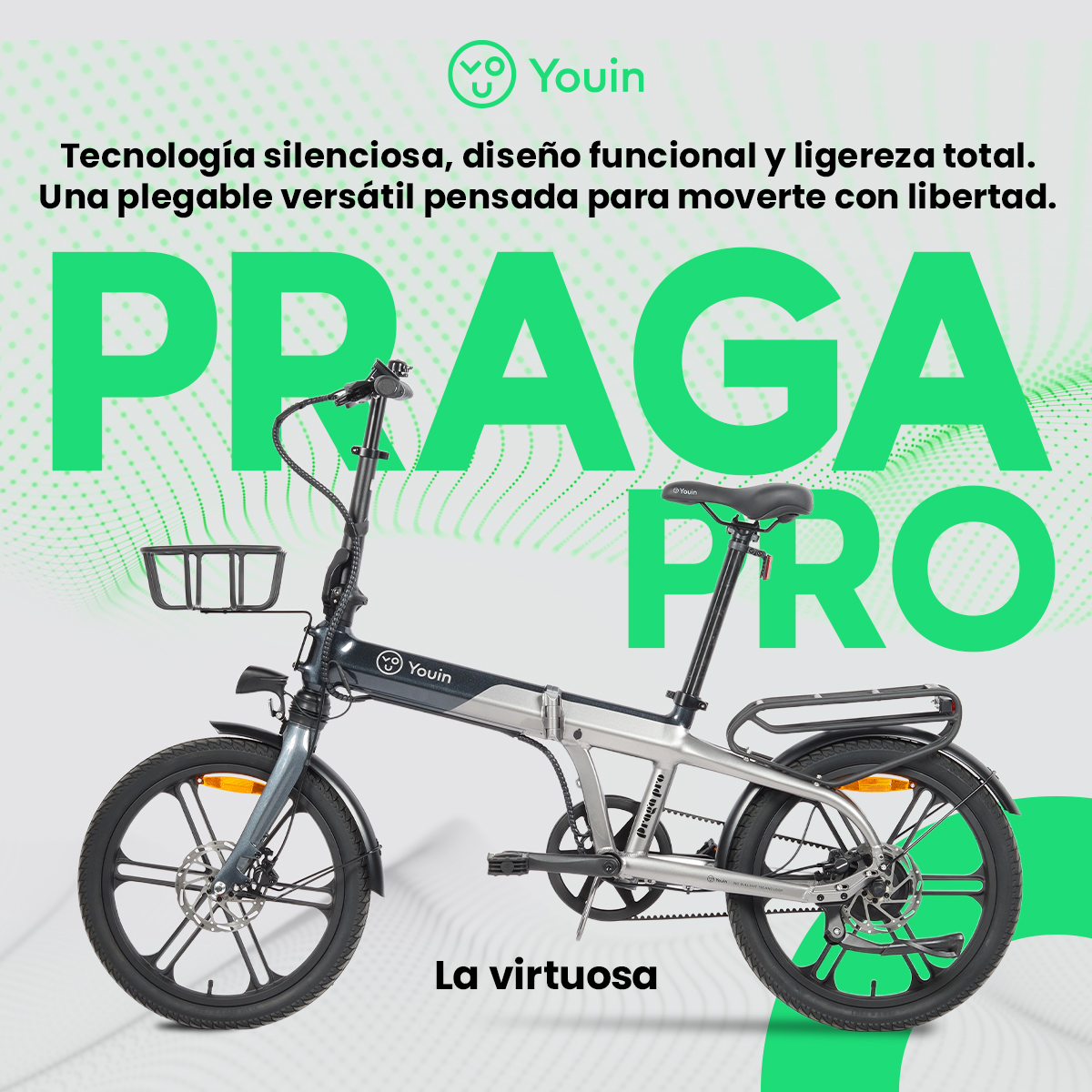 Bicicleta plegable gris con componentes negros, texto "PRAGA PRO" en el cuadro.