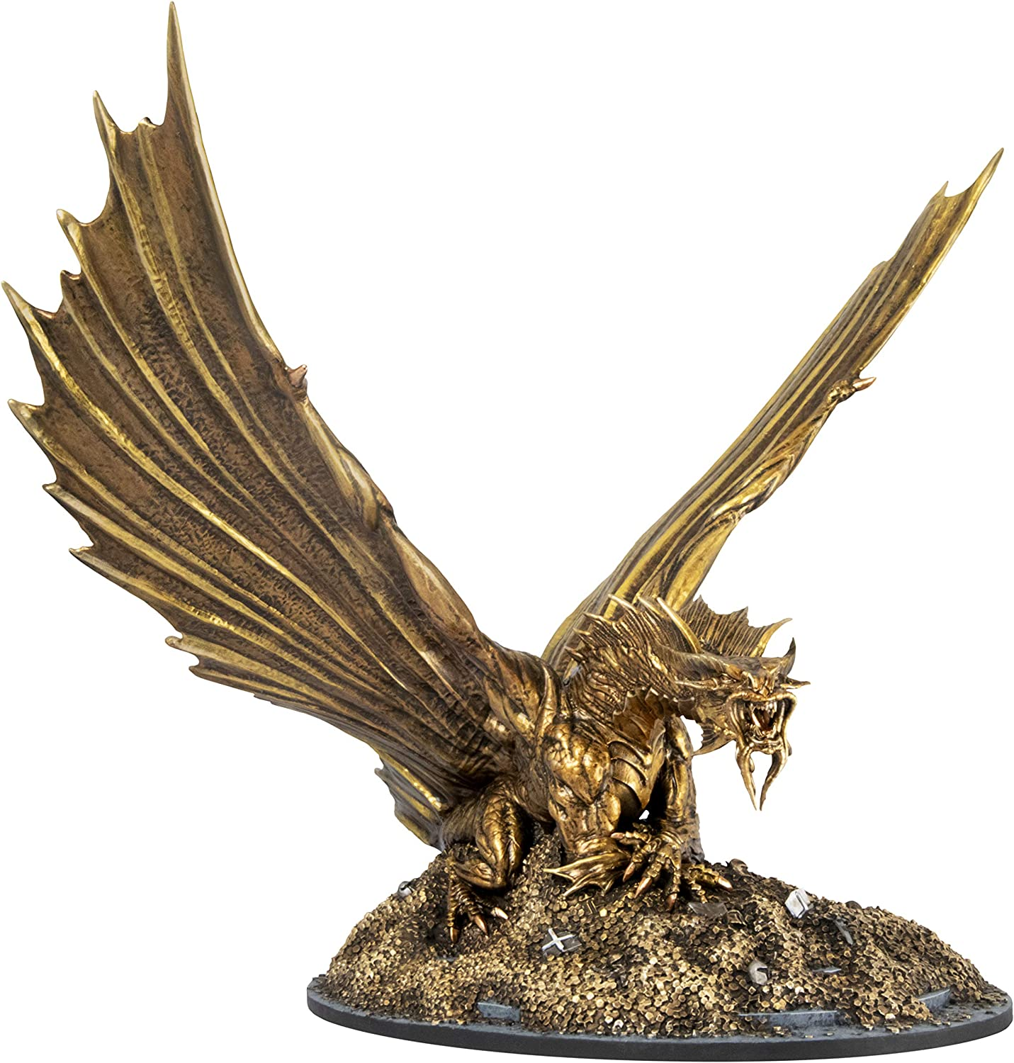Goldene Drachenstatue mit ausgestreckten Flügeln auf felsigem Untergrund, vor weißem Hintergrund.