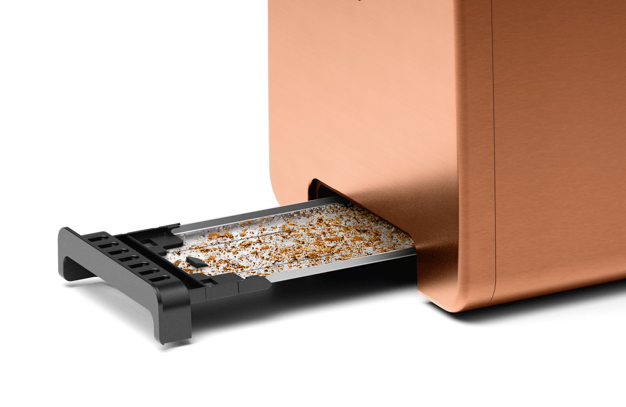 Miedziany toster z wysuwaną tacką na okruchy. Taca ma okruchy.