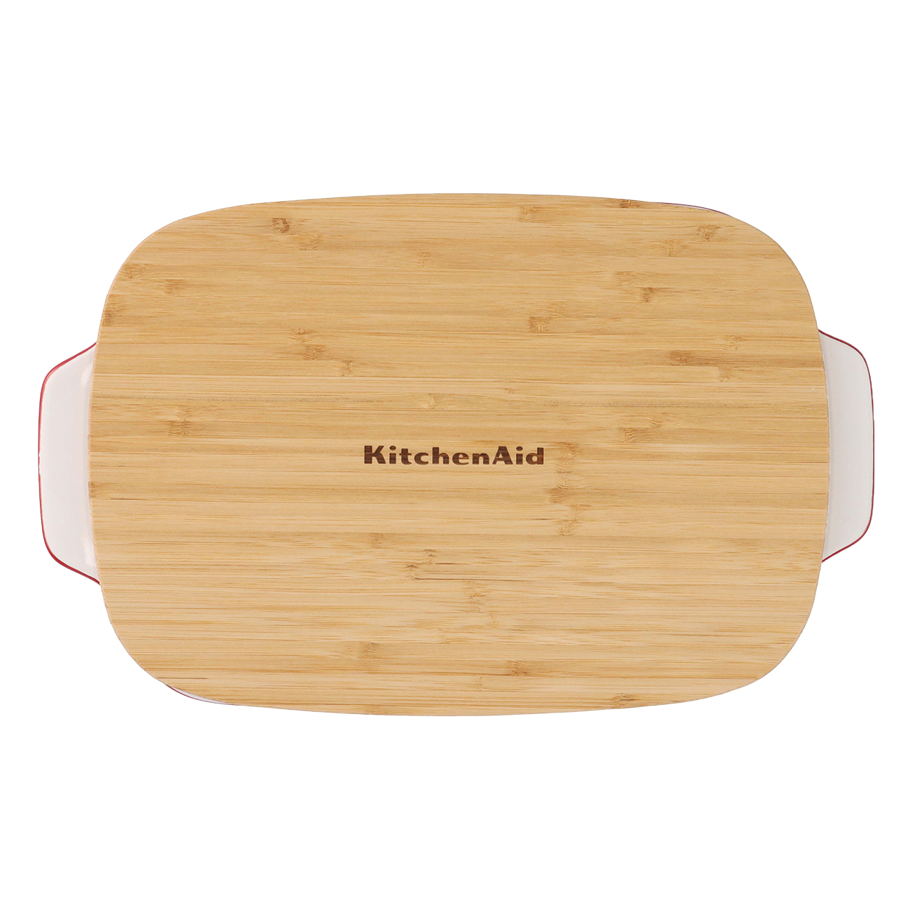 Schneidebrett mit 'KitchenAid'-Logo, auf einer roten und weißen Backform.