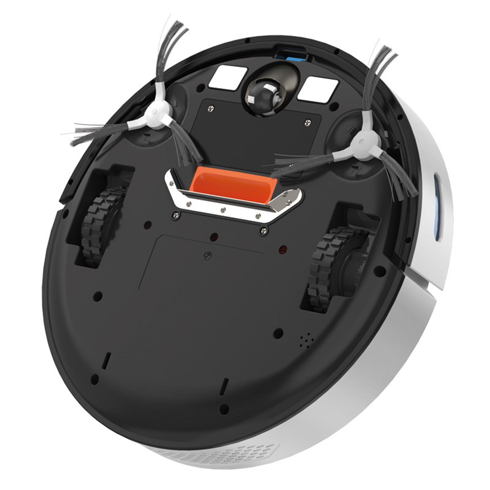 Unteransicht eines Roboter-Staubsaugers. Die Bürsten, Räder und die Ladekontakte sind sichtbar.
