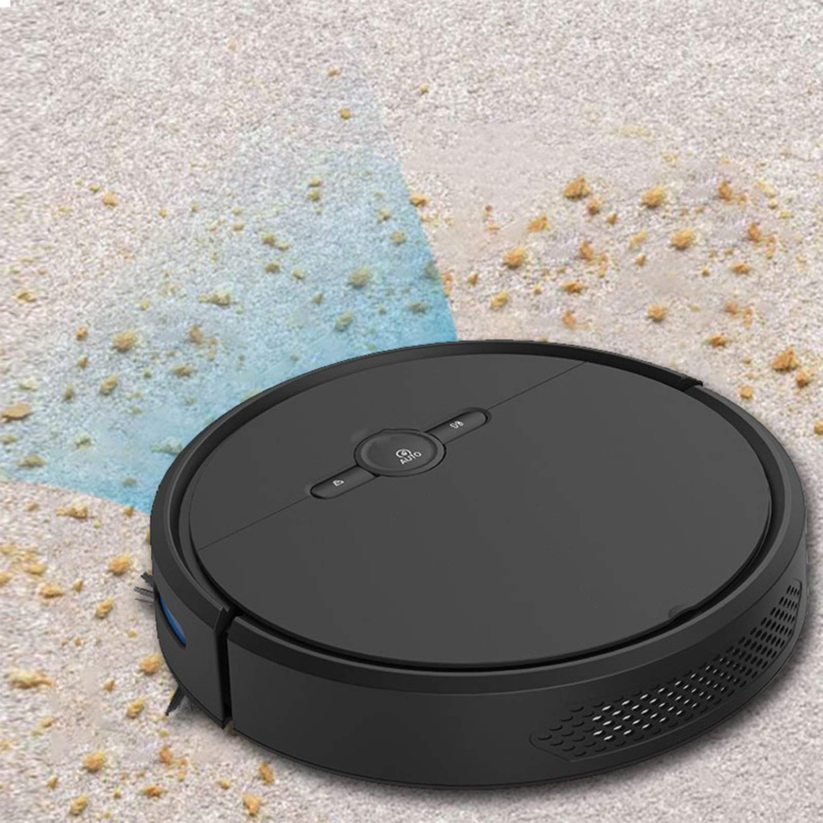 Schwarzer Roboter-Staubsauger auf beigefarbenem Teppich mit Schmutz. Der Sauger ist rund.