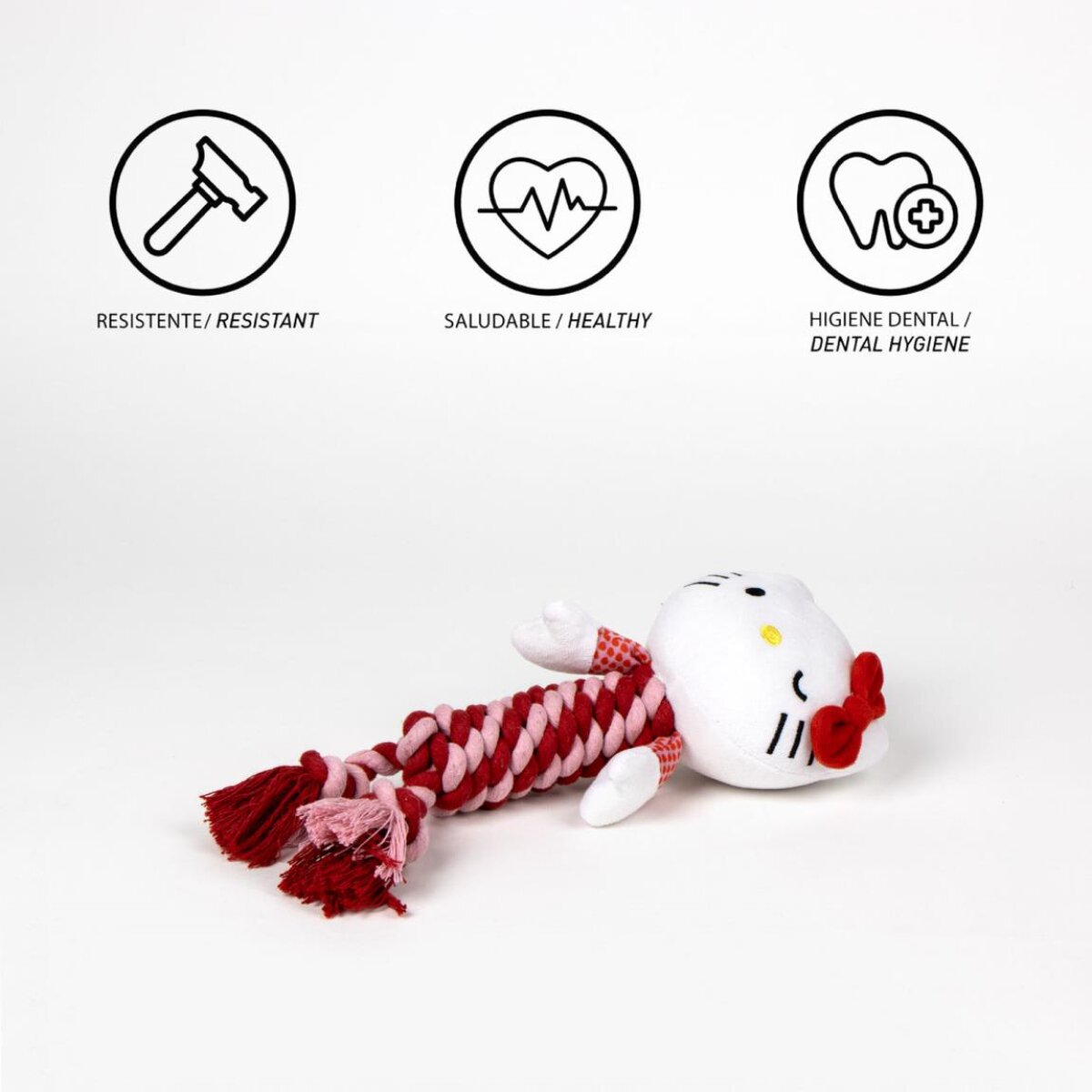Ein Hello Kitty-Spielzeug mit einem Seil. Symbole von Hammer, Herz und Zahn sind darüber abgebildet.