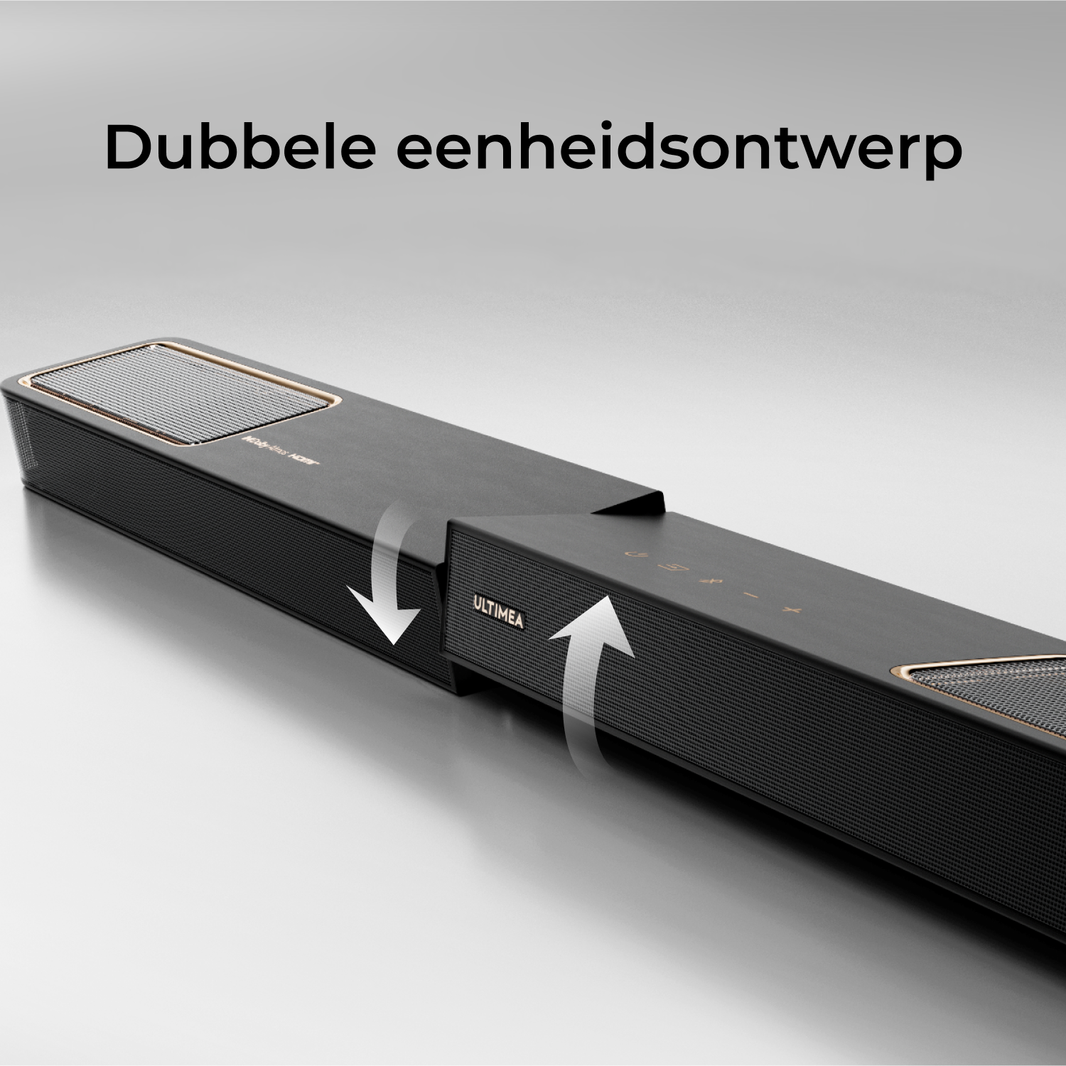 Zwarte soundbar, in twee delen gesplitst. Tekst: Dubbele eenheidsontwerp. Pijlen geven de scheidingsrichting aan. Grijze achtergrond.