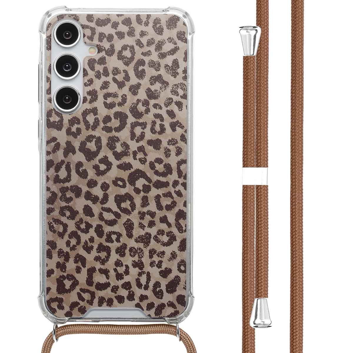 Coque de téléphone avec imprimé léopard. Taches marron sur fond marron clair. Cordon et accessoires marron.