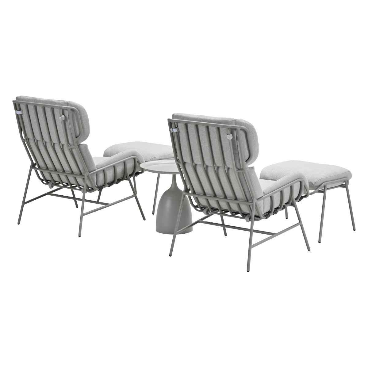 Two gray chairs with ottomans and a small table. The chairs have high backs and metal frames. White background.