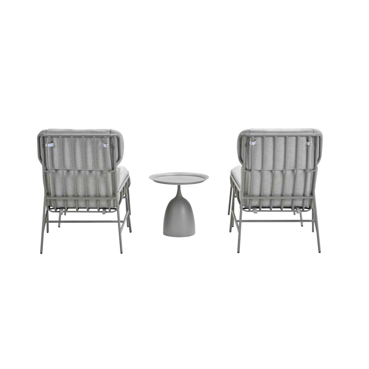 Two gray chairs and a small table on a white background. The chairs face outward.