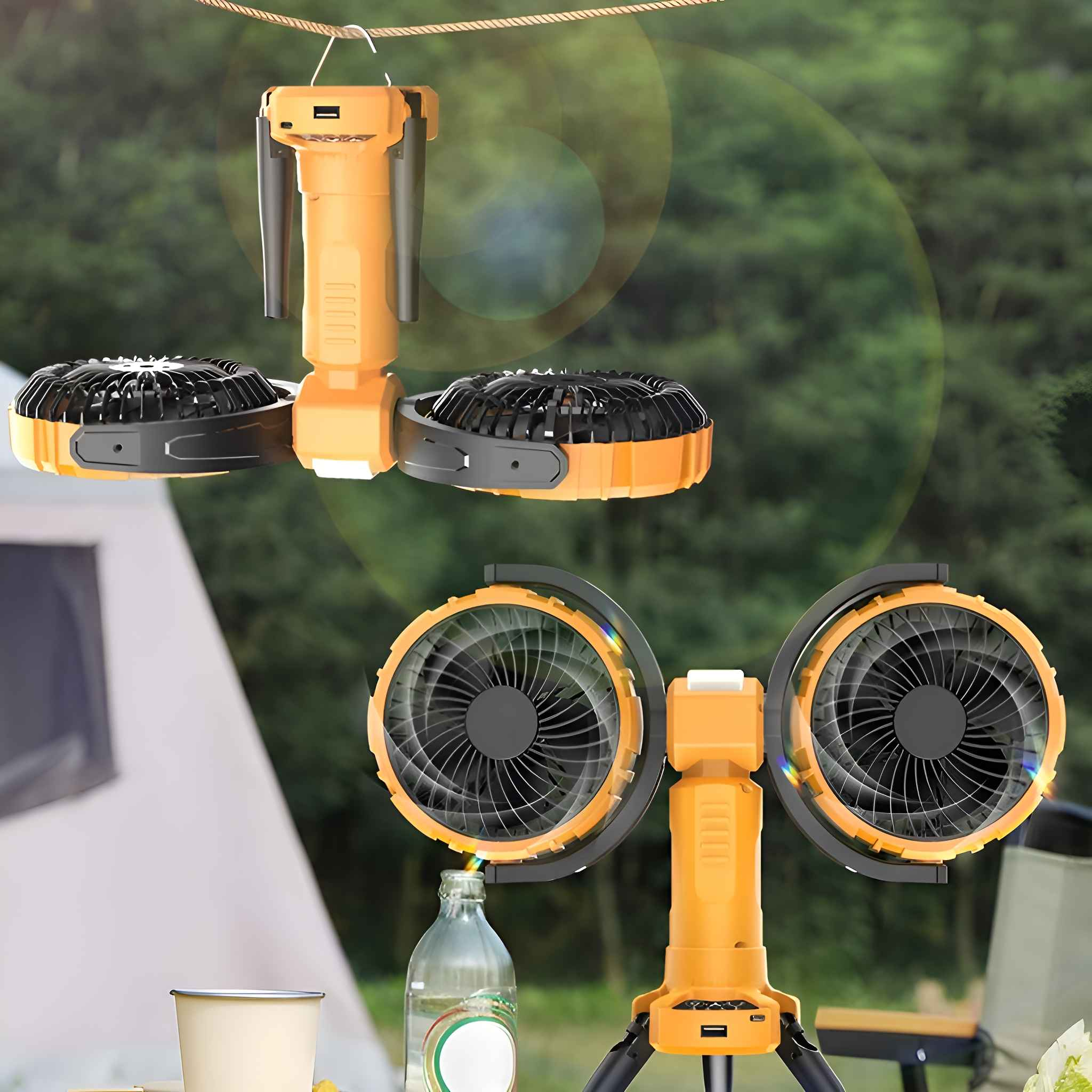 Zwei tragbare Ventilatoren auf einem Stativ und einer hängend, mit einer Flasche, einer Tasse und einem Zelt im Hintergrund.