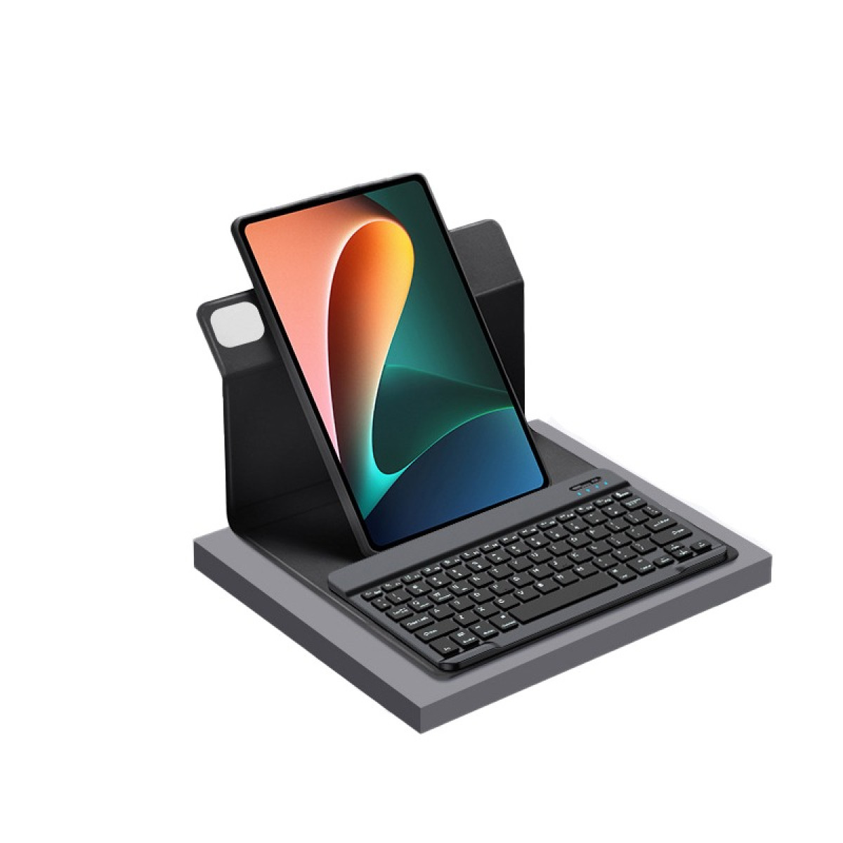 Tablet su supporto grigio con tastiera. Il tablet è nero e lo schermo è acceso.