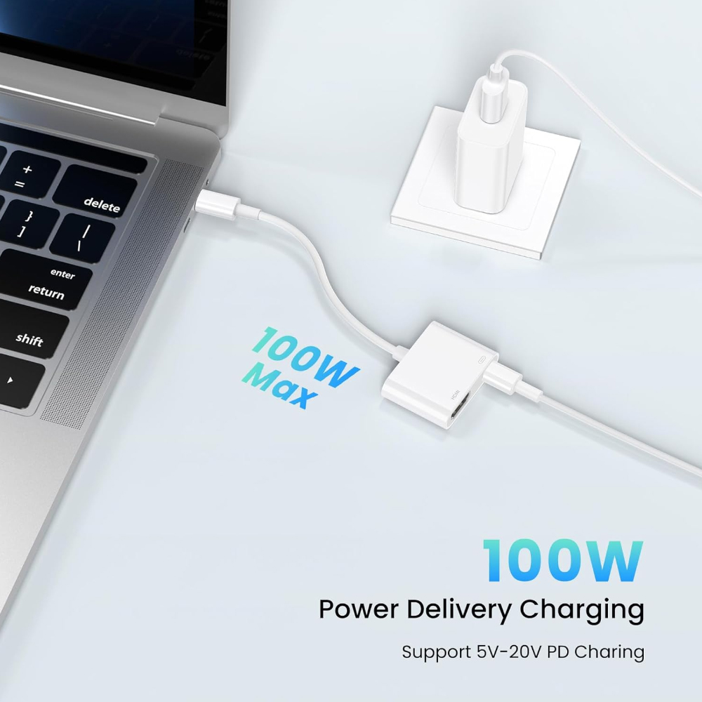 Ein Laptop, der mit einem Ladegerät und einem weißen Adapter mit HDMI-Anschluss verbunden ist. Der Text lautet '100W Max'.