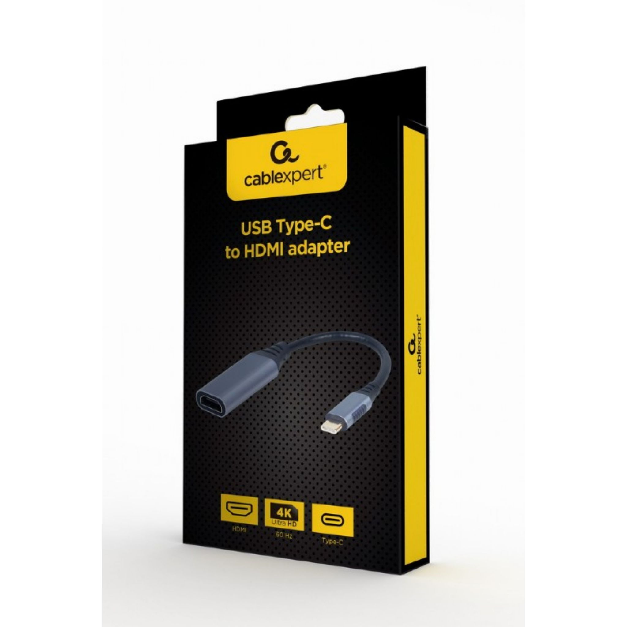 Une boîte noire et jaune avec un adaptateur USB Type-C vers HDMI.