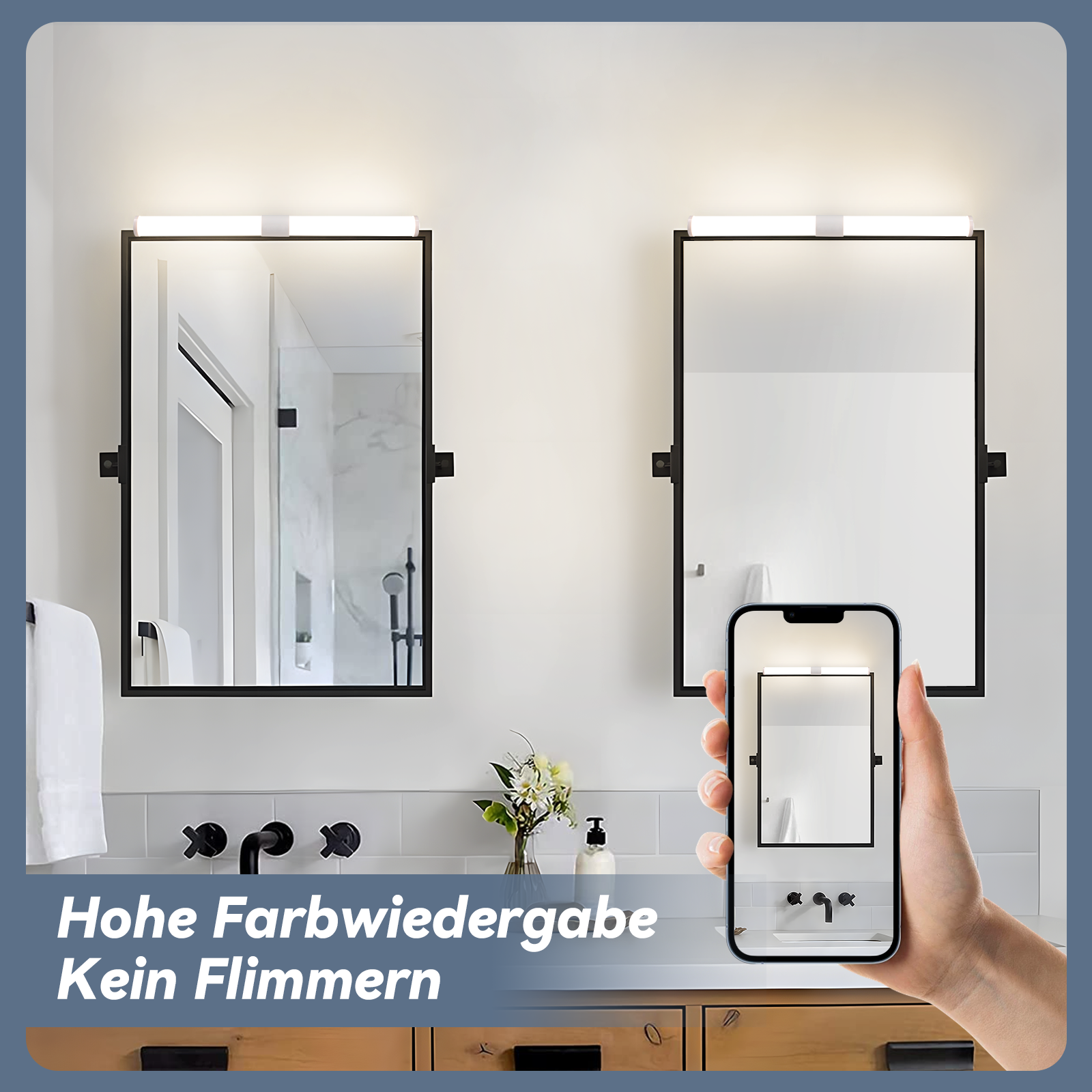 Ein Badezimmer mit zwei Spiegeln, Lichtern und einer Hand, die ein Telefon mit Spiegelbild hält.