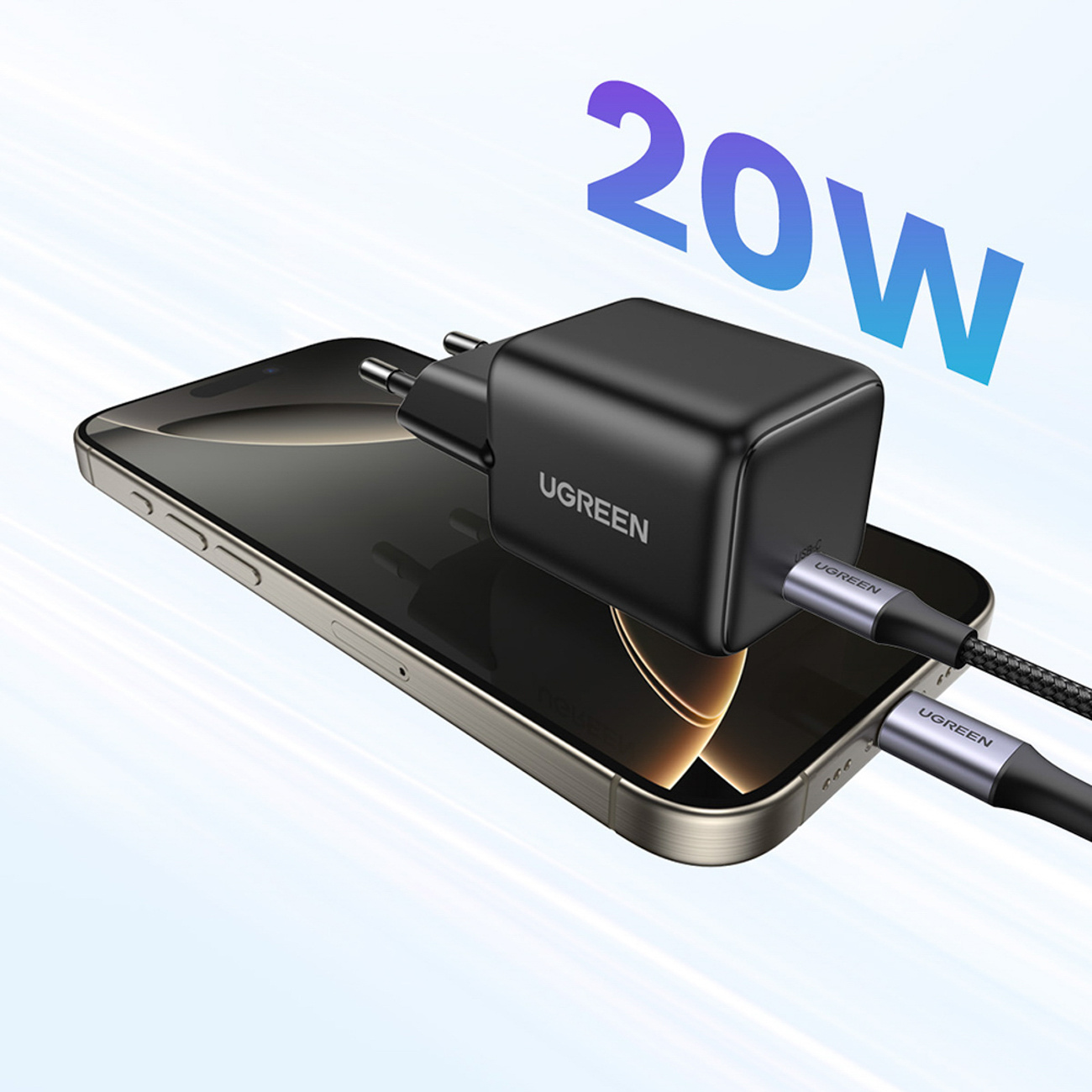 Czarna ładowarka USB-C UGREEN ładująca telefon. Widoczny tekst "20W".