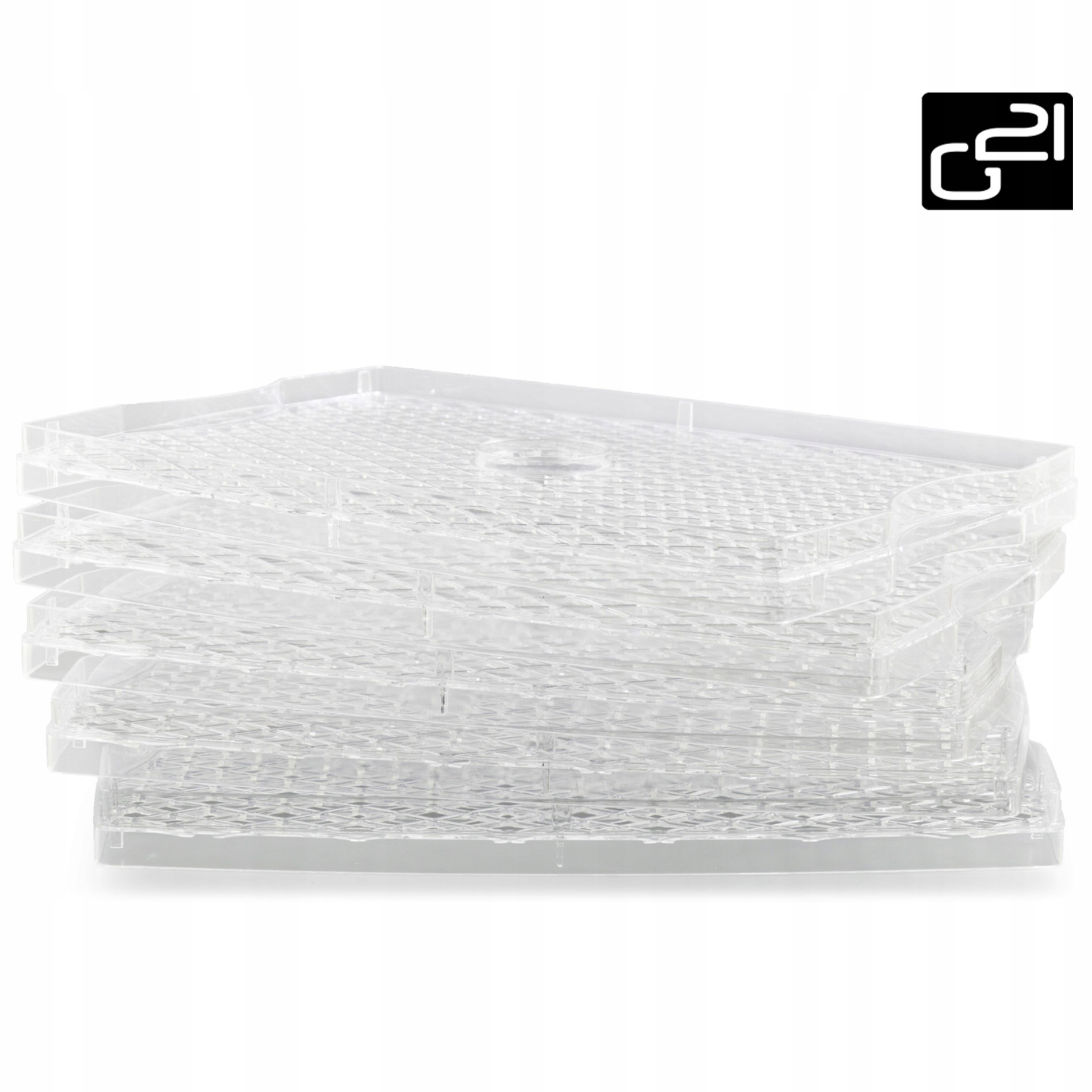 Stos przezroczystych tacek do dehydratora żywności. Tace są prostokątne z wzorem siatki.